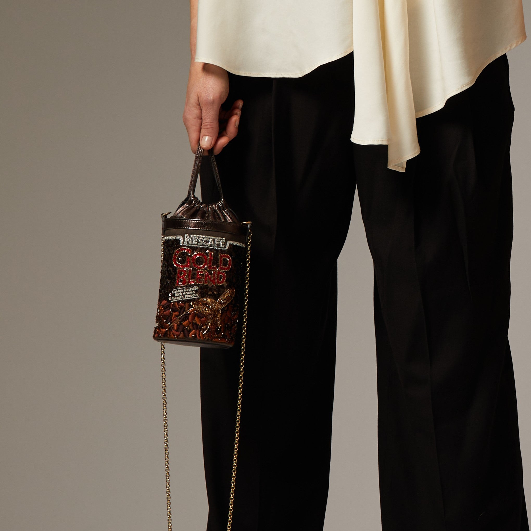 Anya Brands Gold Blend Mini Bucket Bag -

                  
                    Sequins in Chocolate -
                  

                  Anya Hindmarch US
