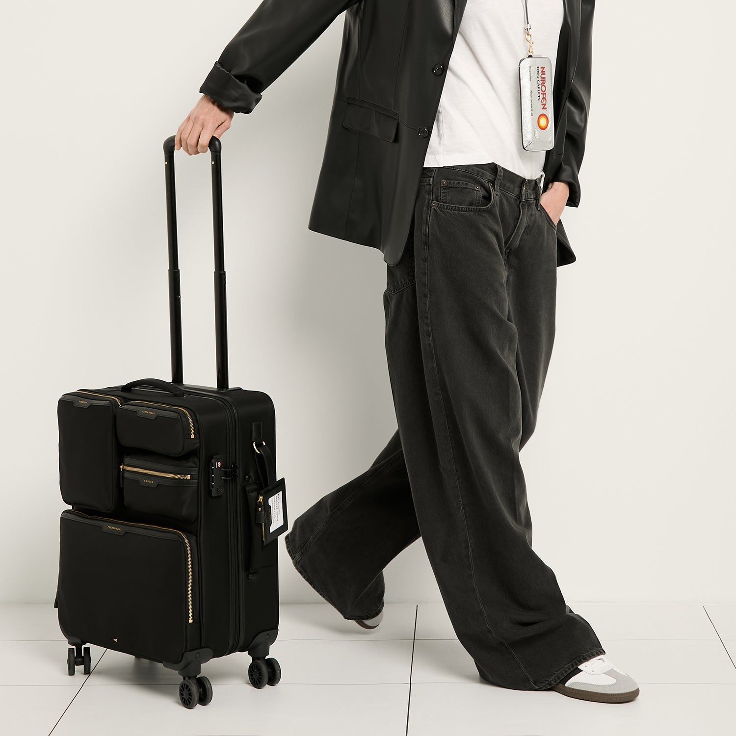 25SS new/Anya Hindmarch ワードローブECONYLトラベルケース Bag Short-Haul Suitcase | Anya Hindmarch US