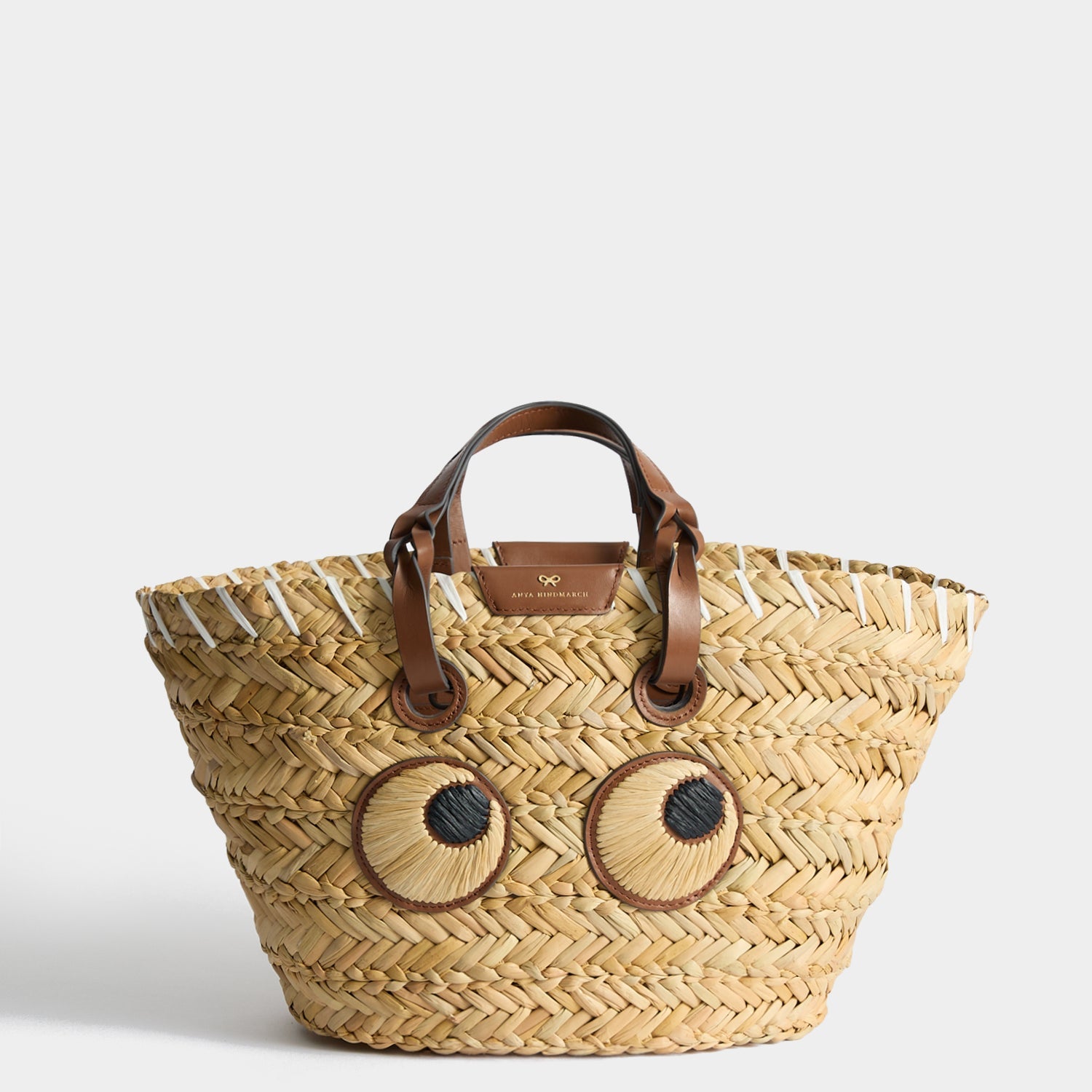 アニヤ ハインドマーチ / EYES SMALL PAPER BASKET Small Paper Basket Bag with Eyes | Anya Hindmarch US