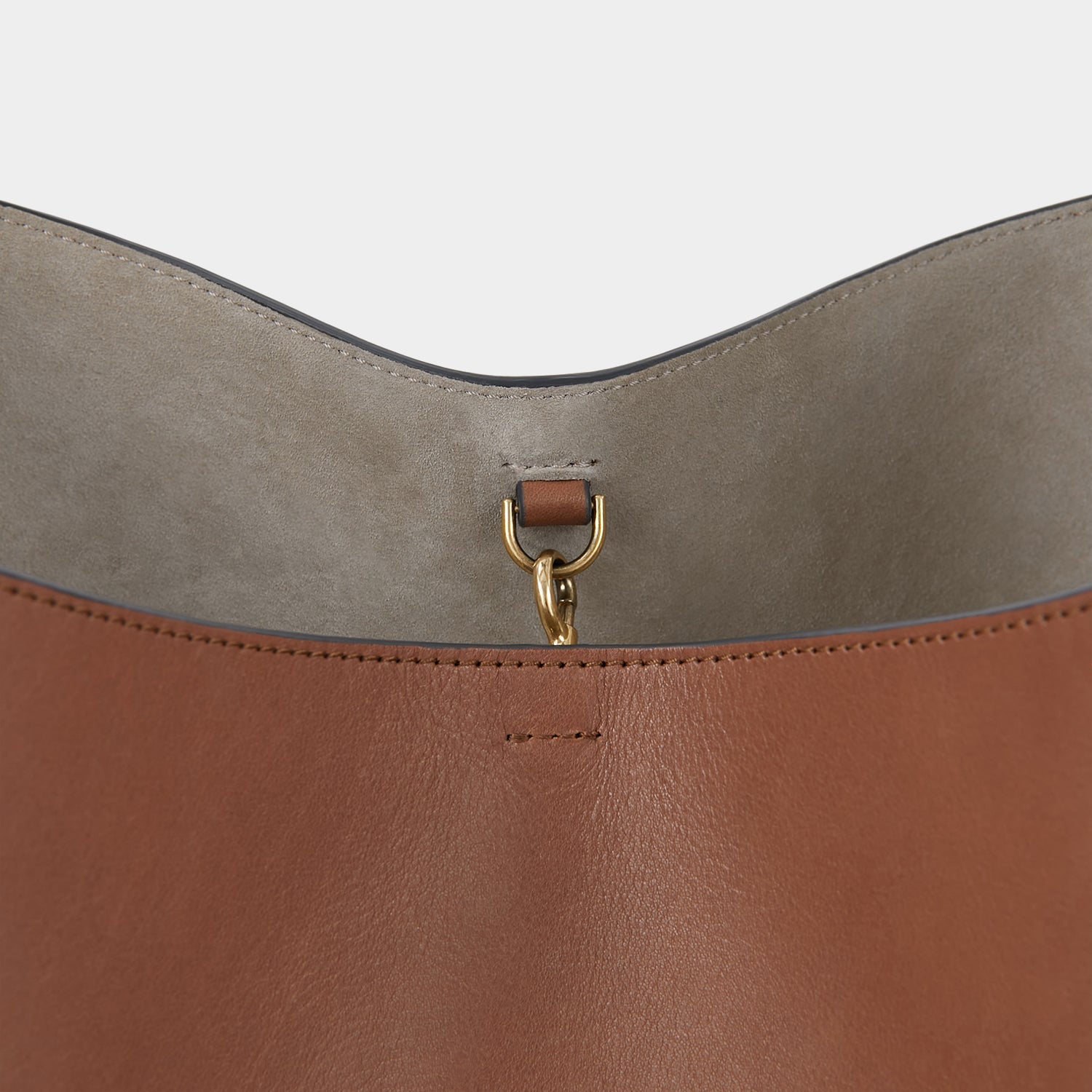 Nastro Small Hobo Bag -

                  
                    Flat Leather in Cedar -
                  

                  Anya Hindmarch US
