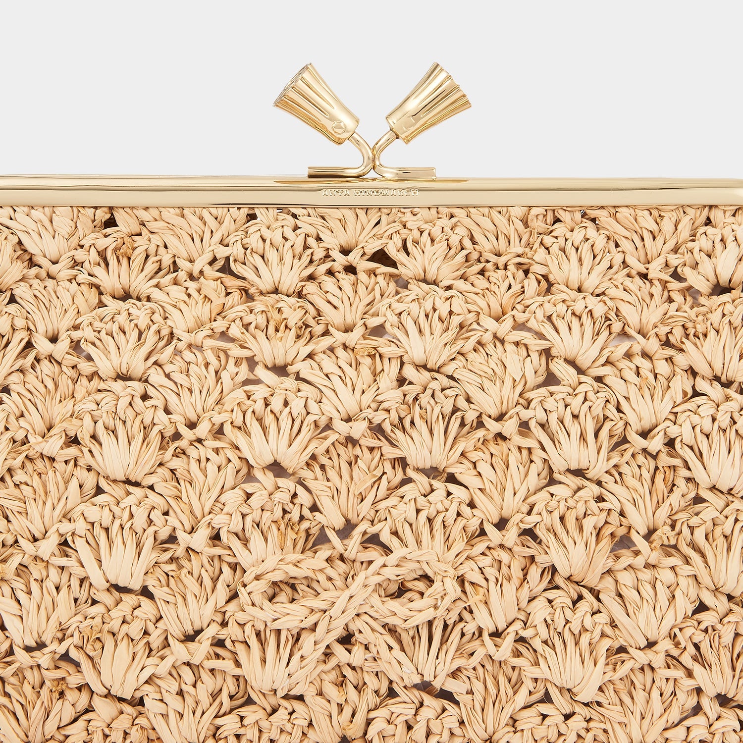 Maud Large Bow Clutch -

                  
                    Raffia in Natural -
                  

                  Anya Hindmarch US

