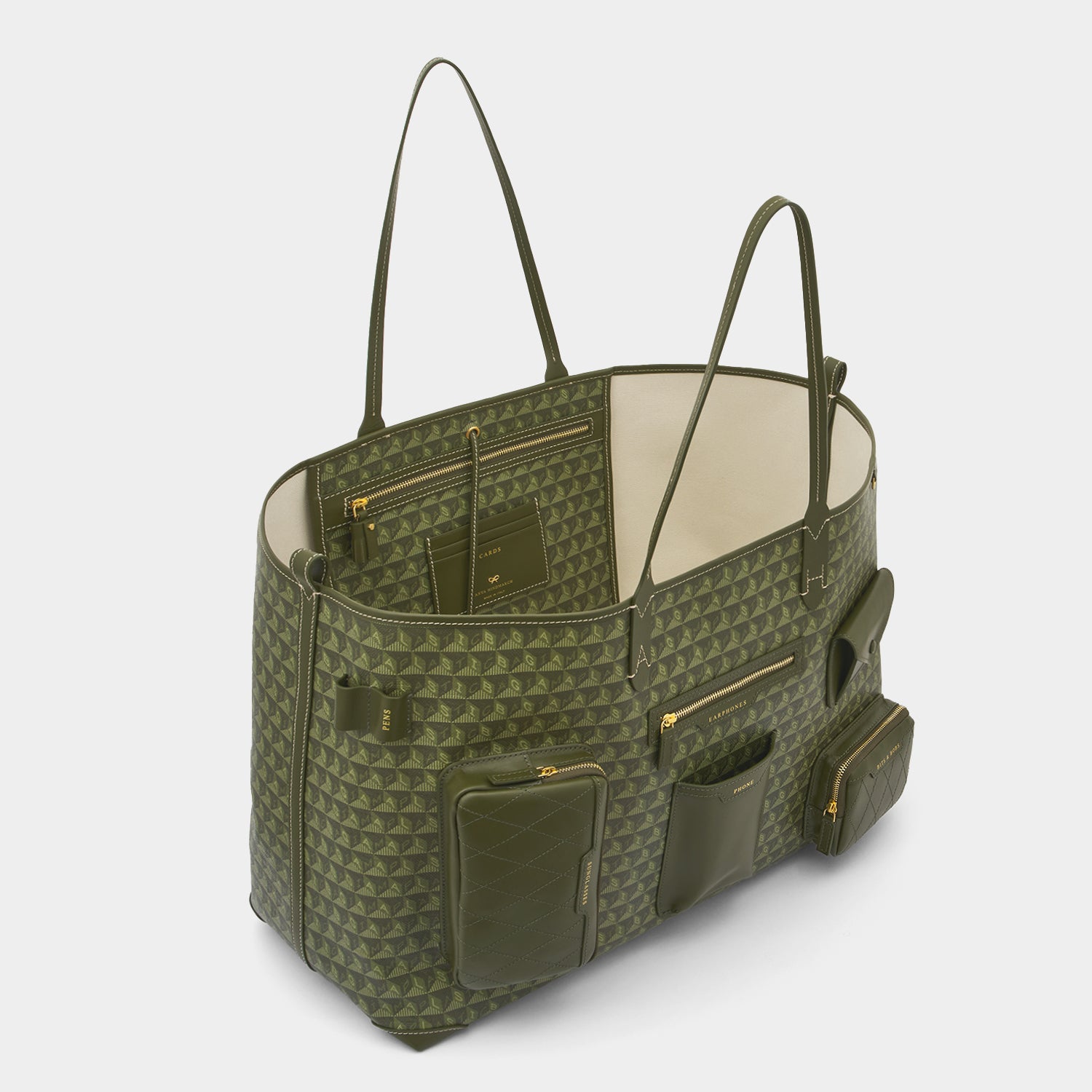 I Am A Plastic Bag XL Multi Pocket Tote -

                  
                    Recycled Canvas in Fern -
                  

                  Anya Hindmarch US
