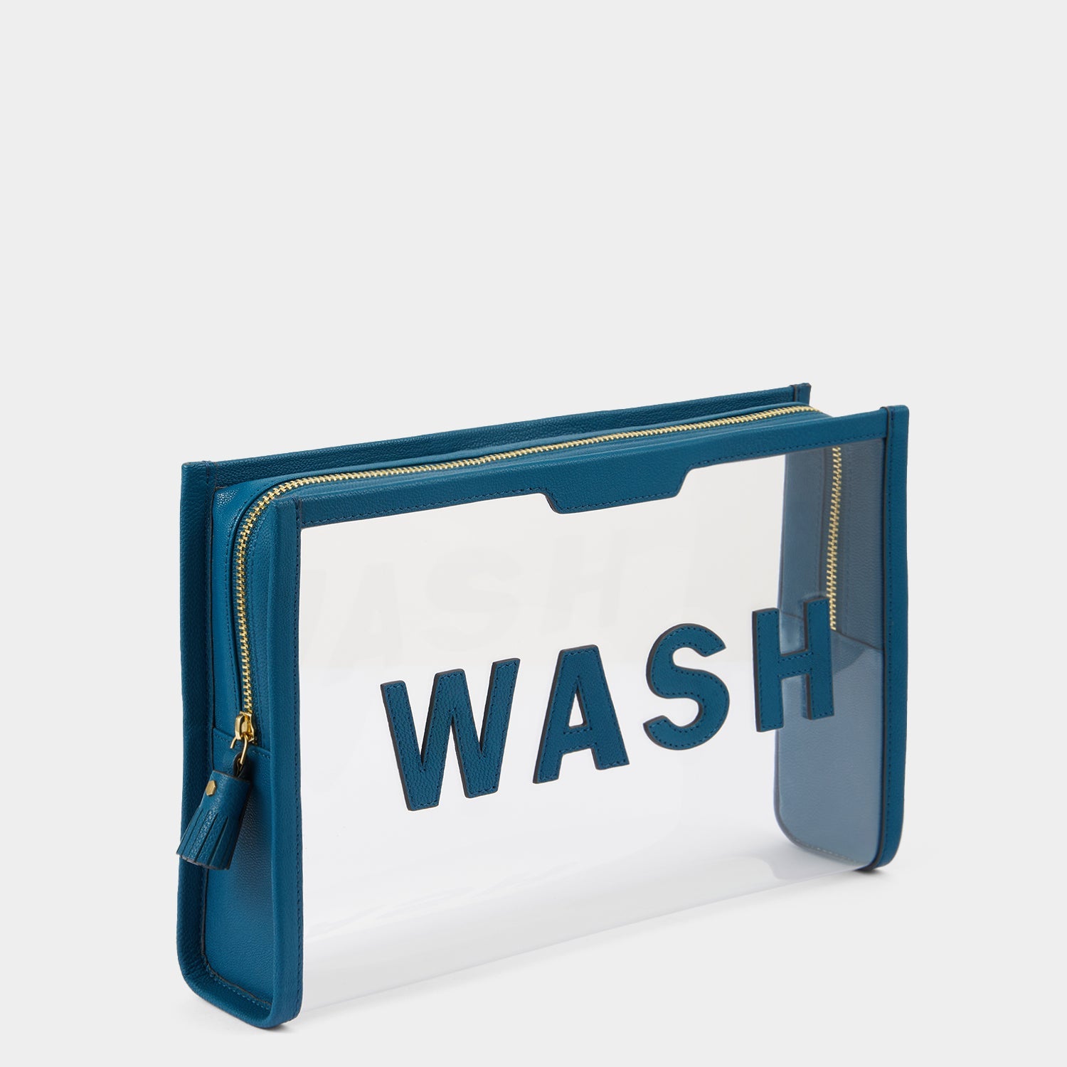 Wash Pouch -

                  
                    Capra in Clear/Light Petrol -
                  

                  Anya Hindmarch US
