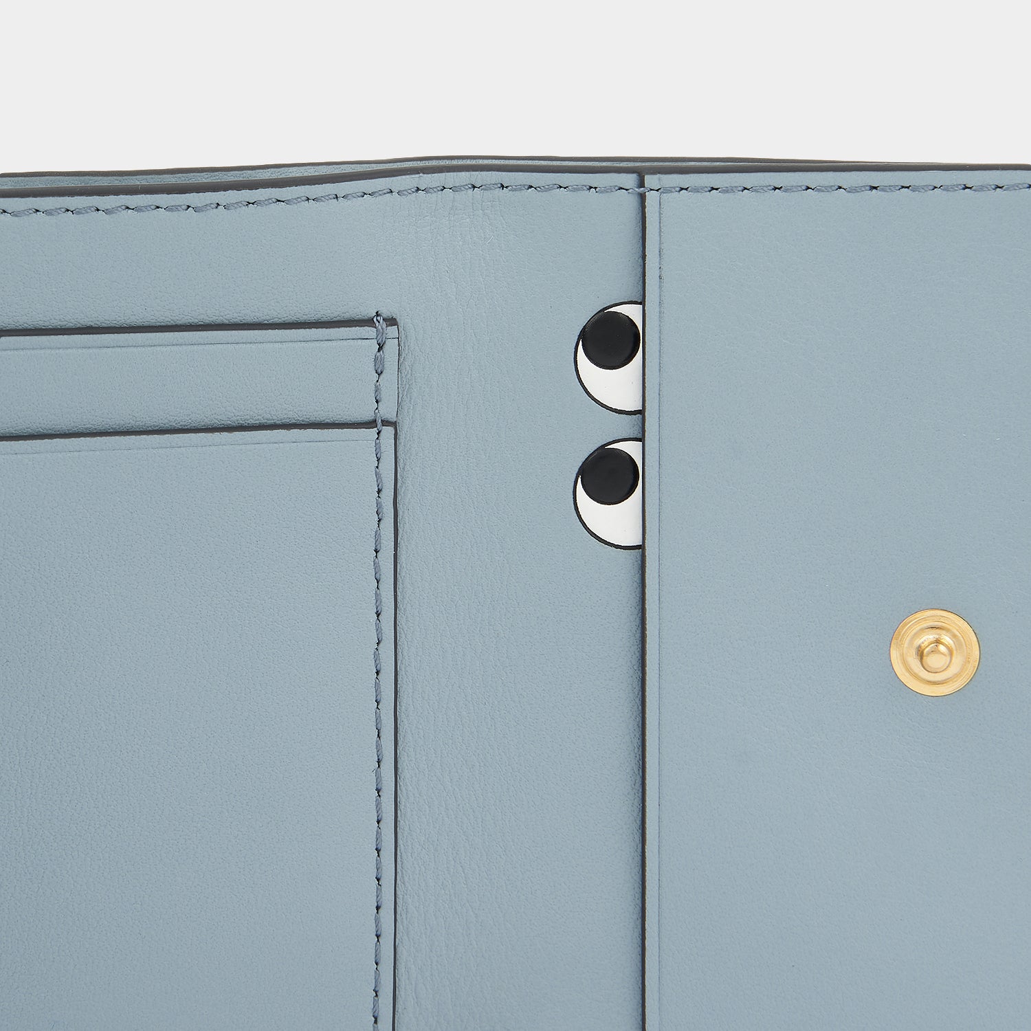 Peeping Eyes Mini Trifold Zip Wallet -

                  
                    Capra Leather in Rosewood -
                  

                  Anya Hindmarch US
