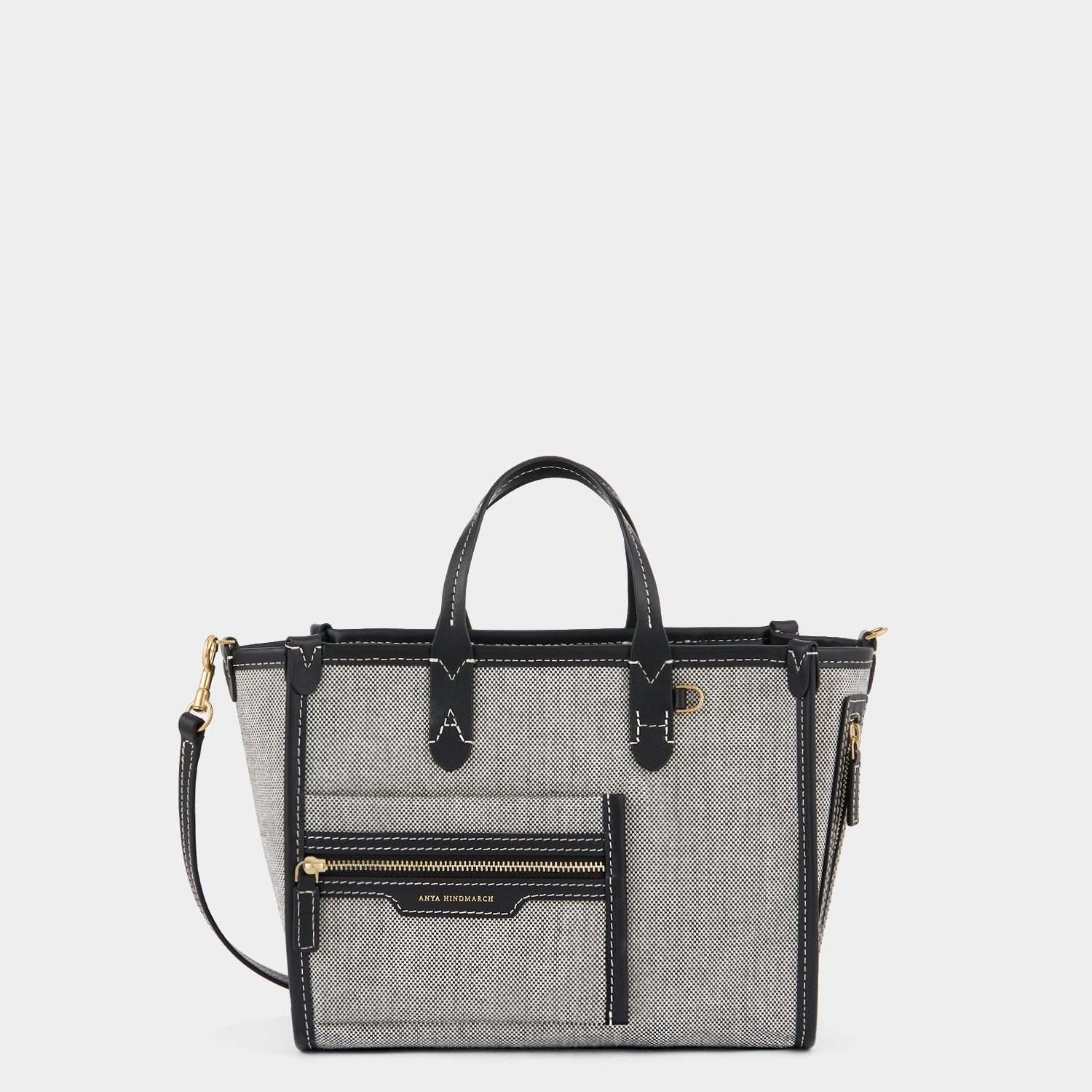Pocket XS Tote -

                  
                    Mixed Canvas in Salt And Pepper -
                  

                  Anya Hindmarch US
