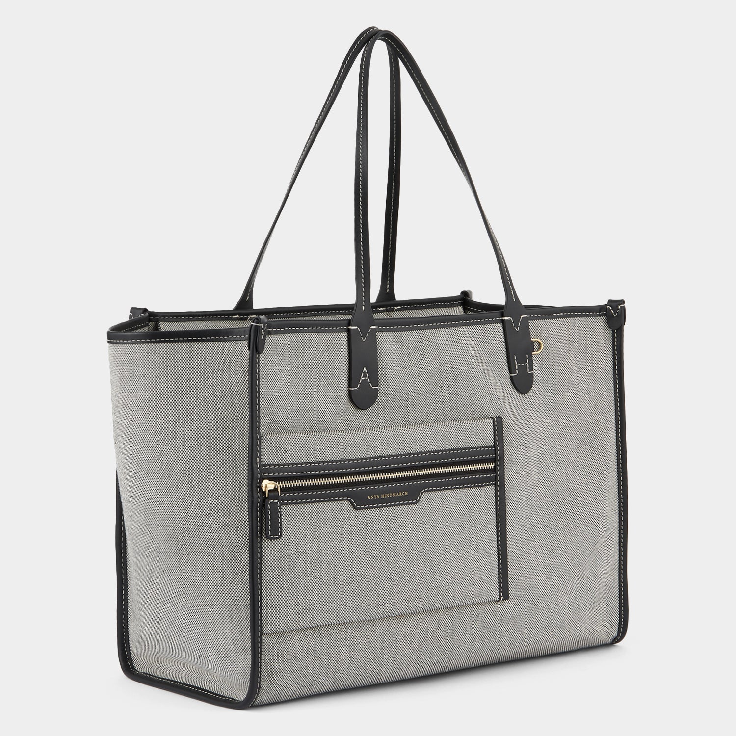 Pocket Tote -

                  
                    Mixed Canvas in Salt And Pepper -
                  

                  Anya Hindmarch US

