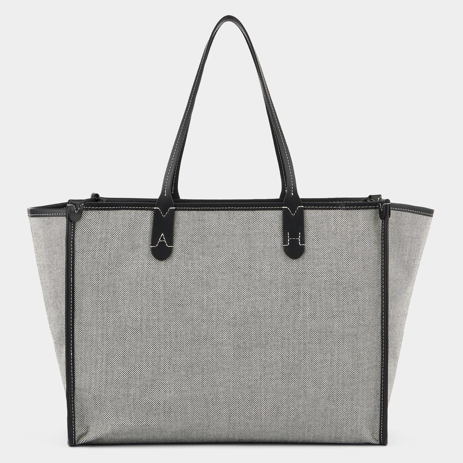 Pocket Tote -

                  
                    Mixed Canvas in Salt And Pepper -
                  

                  Anya Hindmarch US
