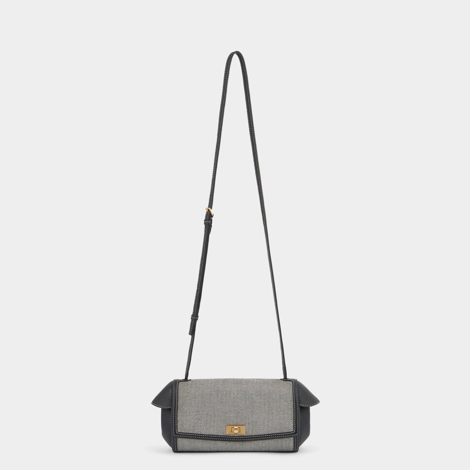 Tube Shoulder Bag -

                  
                    Mixed Canvas in Salt And Pepper -
                  

                  Anya Hindmarch US
