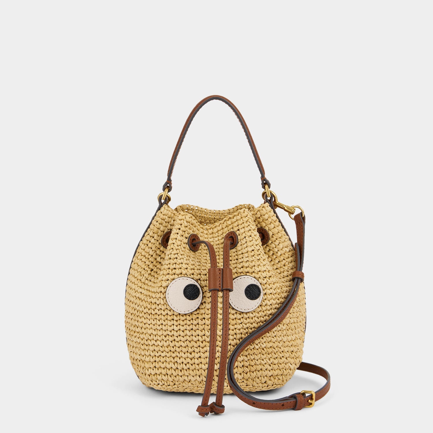 Raffia Eyes Drawstring Cross-body Natural Raffia in Natural