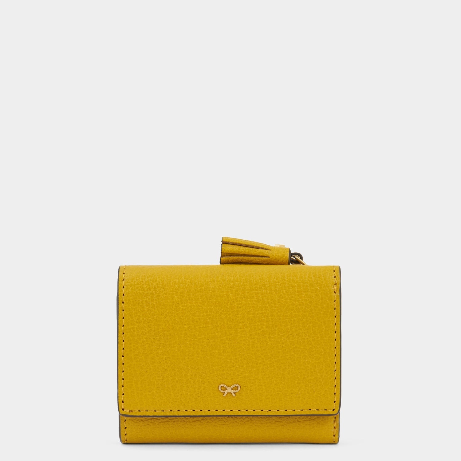 Peeping Eyes Mini Trifold Zip Wallet -

                  
                    Capra Leather in Mustard -
                  

                  Anya Hindmarch US
