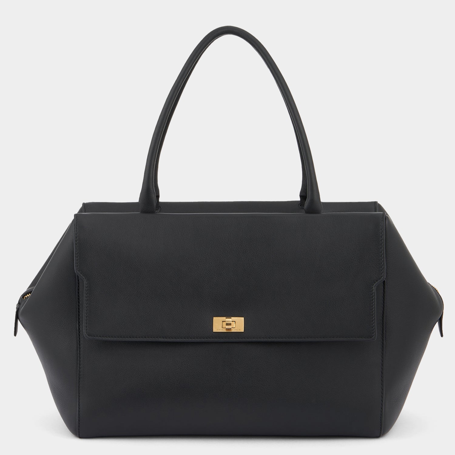 Seaton Top Handle -

                  
                    Calf Leather in Black -
                  

                  Anya Hindmarch US

