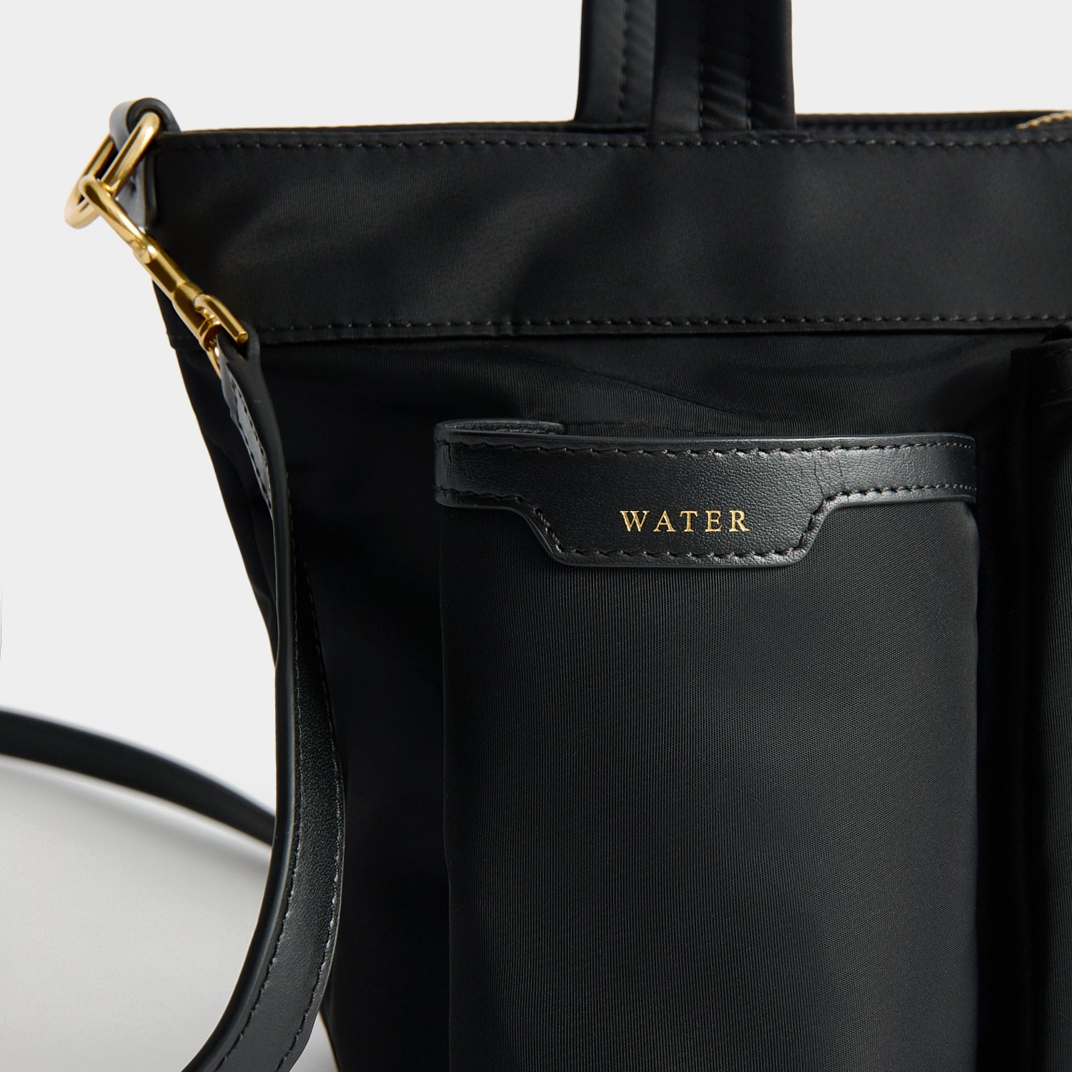 E/W Multi Pocket Mini Cross-body Tote | Anya Hindmarch US