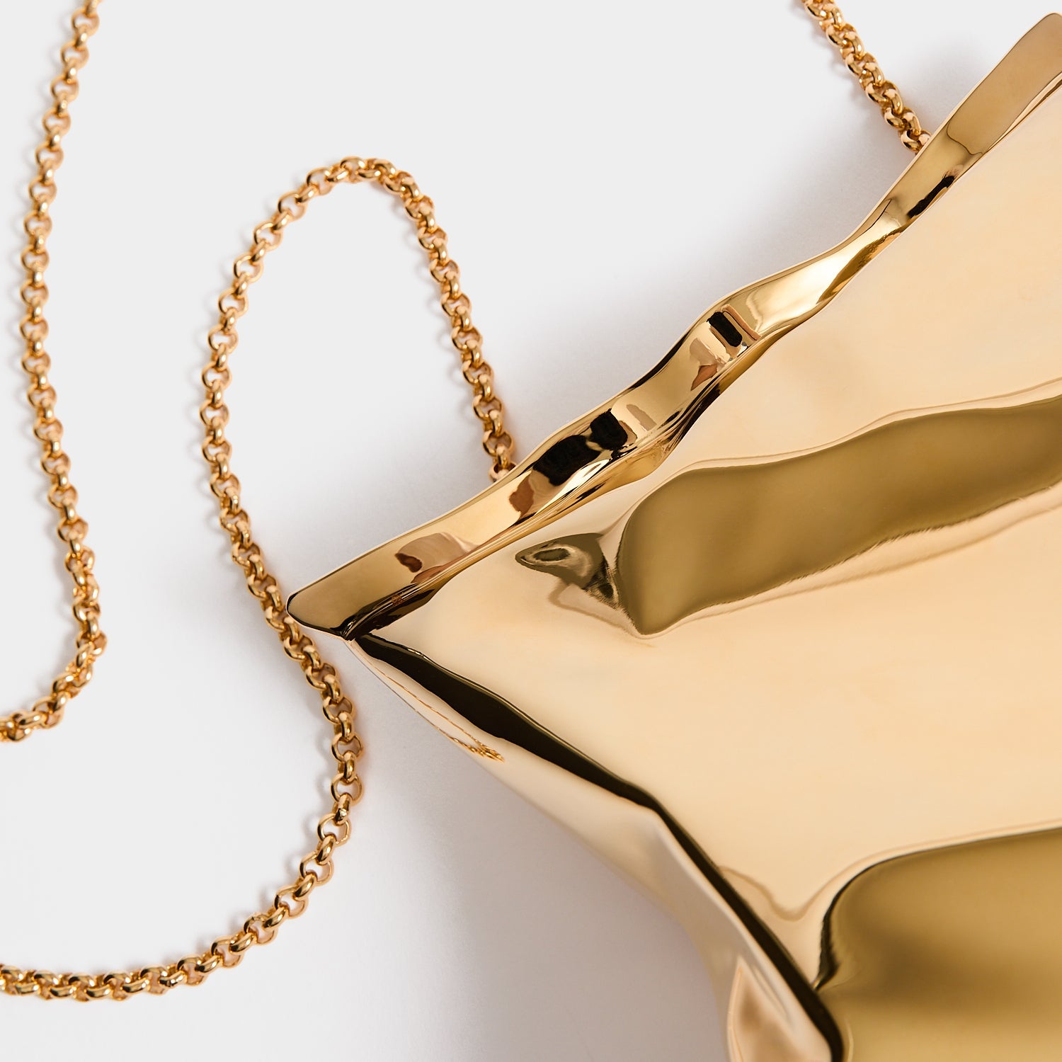 Crisp Packet Clutch Bag in Gold Metal | Anya Hindmarch US