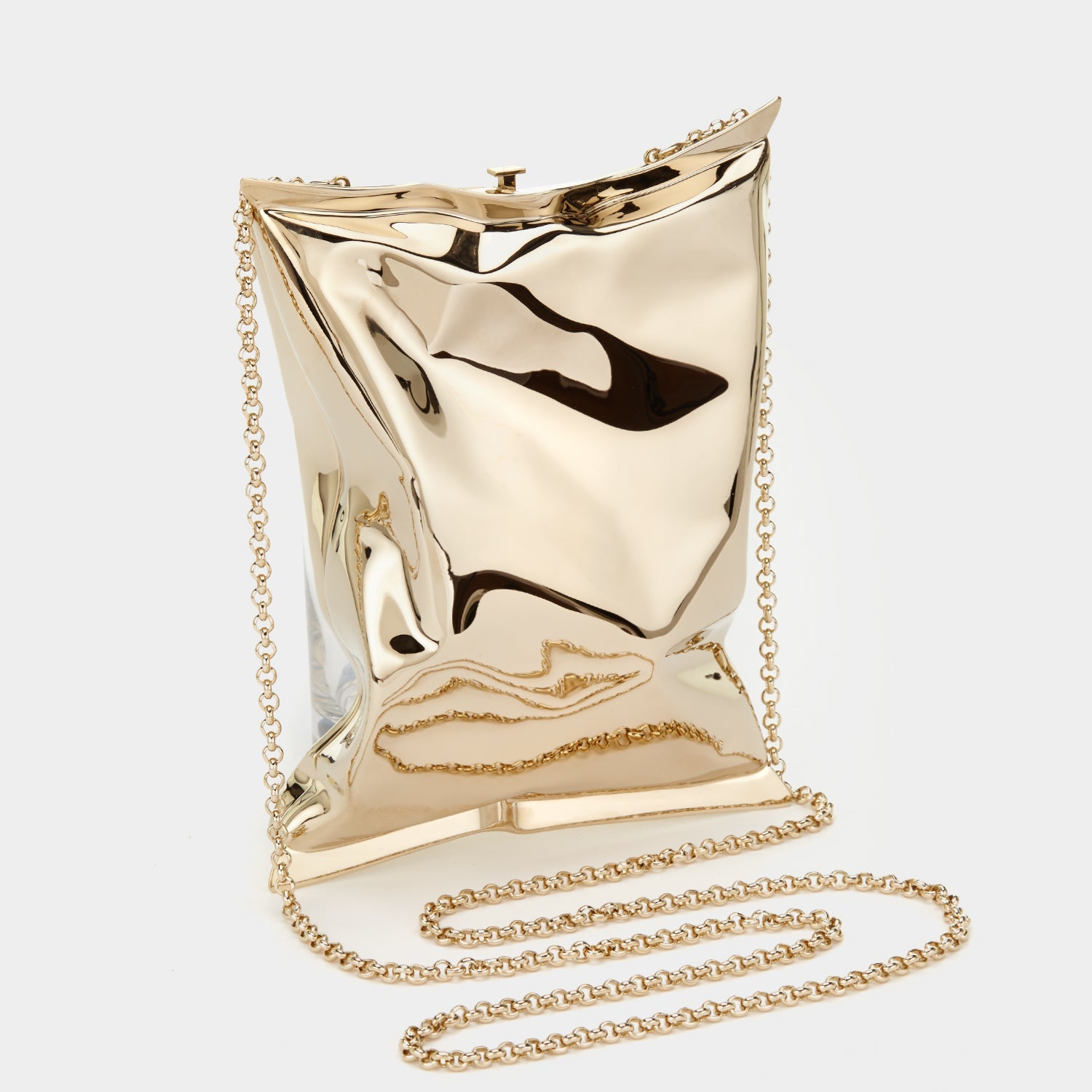 Crisp Packet Clutch -

                  
                    Brass in Pale Gold -
                  

                  Anya Hindmarch US
