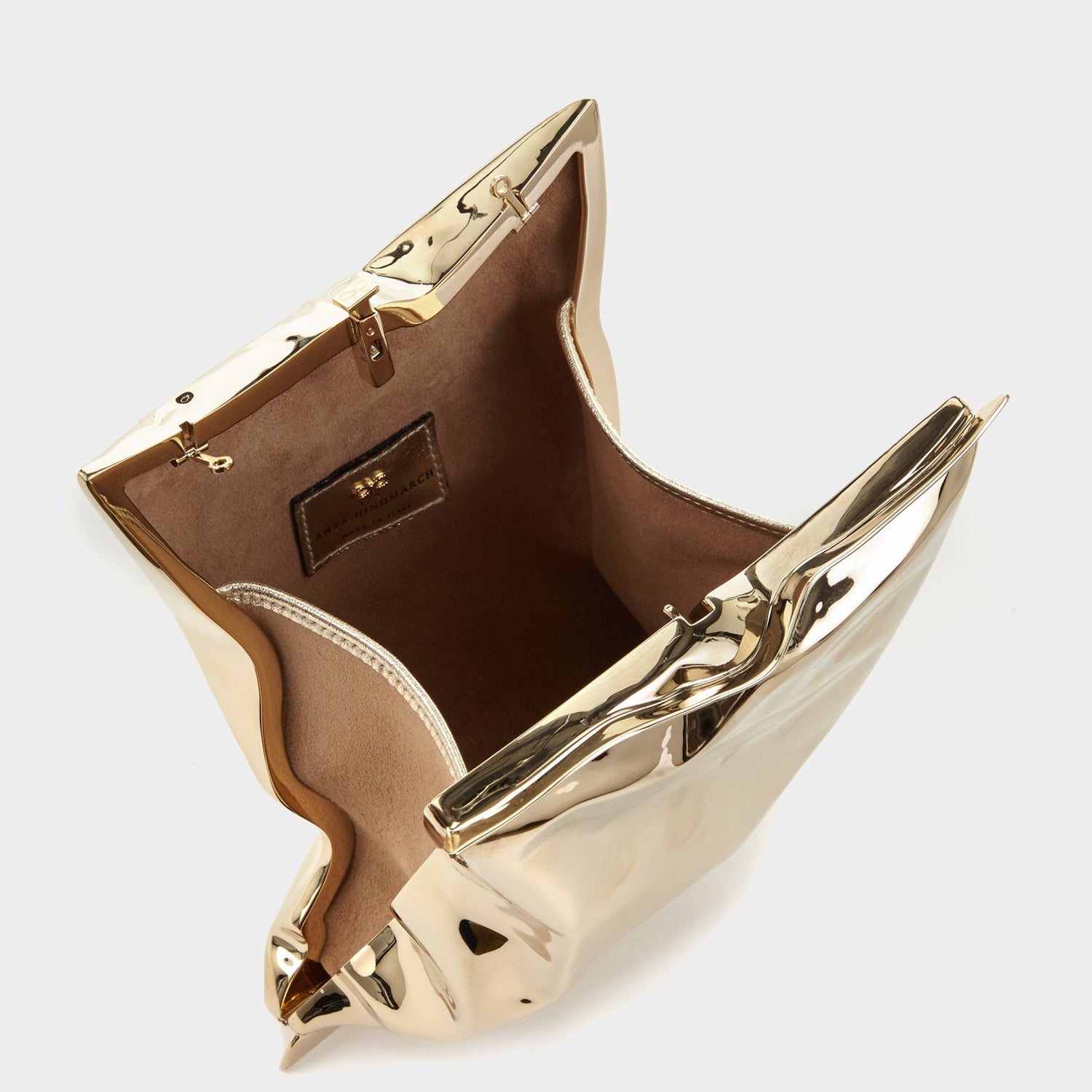 Crisp Packet Clutch -

                  
                    Brass in Pale Gold -
                  

                  Anya Hindmarch US
