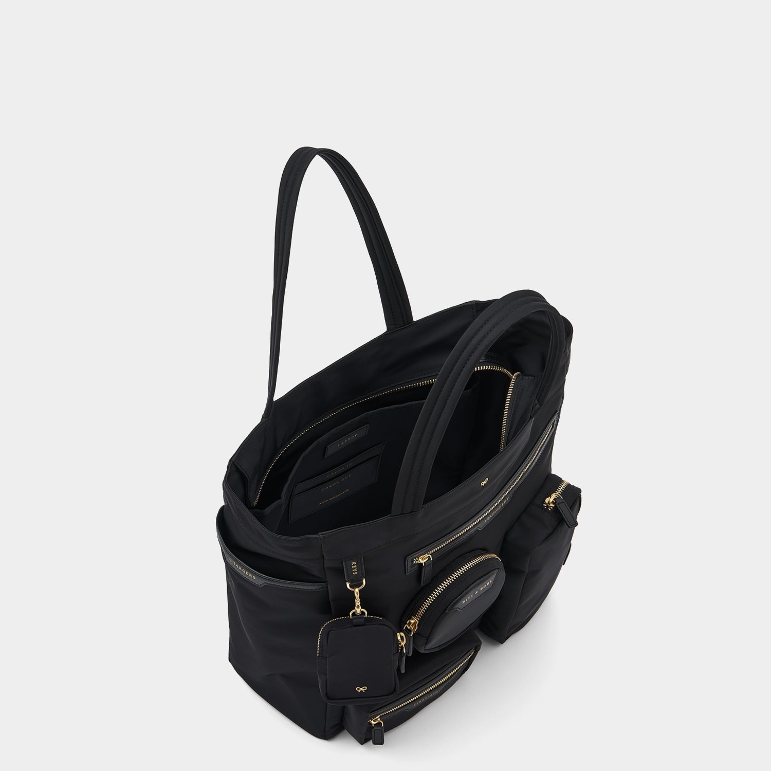 Commuter Tote -

                  
                    Regenerated Econyl® in Black -
                  

                  Anya Hindmarch US
