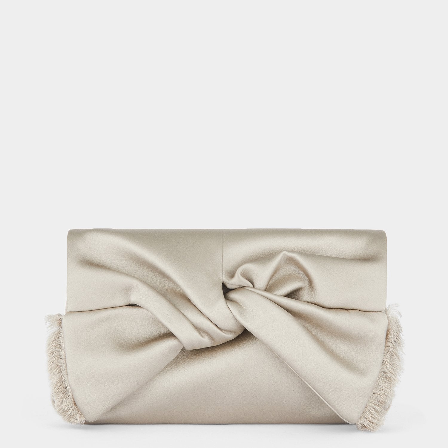 ANYA HINDMARCH + NET SUSTAIN Bow fringed satin clutch