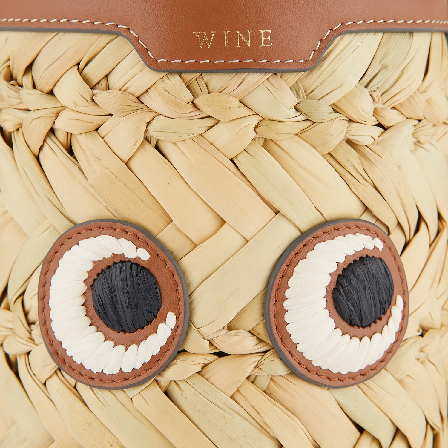 Eyes Wine Bottle Holder -

                  
                    Seagrass in Natural -
                  

                  Anya Hindmarch US
