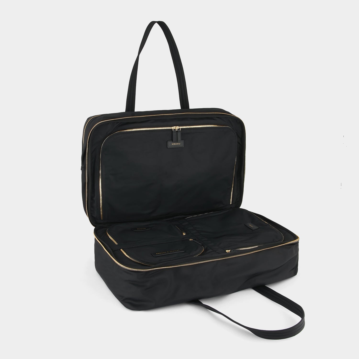 24 Hour Travel Bag -

                  
                    Econyl® Regenerated Nylon in Black -
                  

                  Anya Hindmarch US
