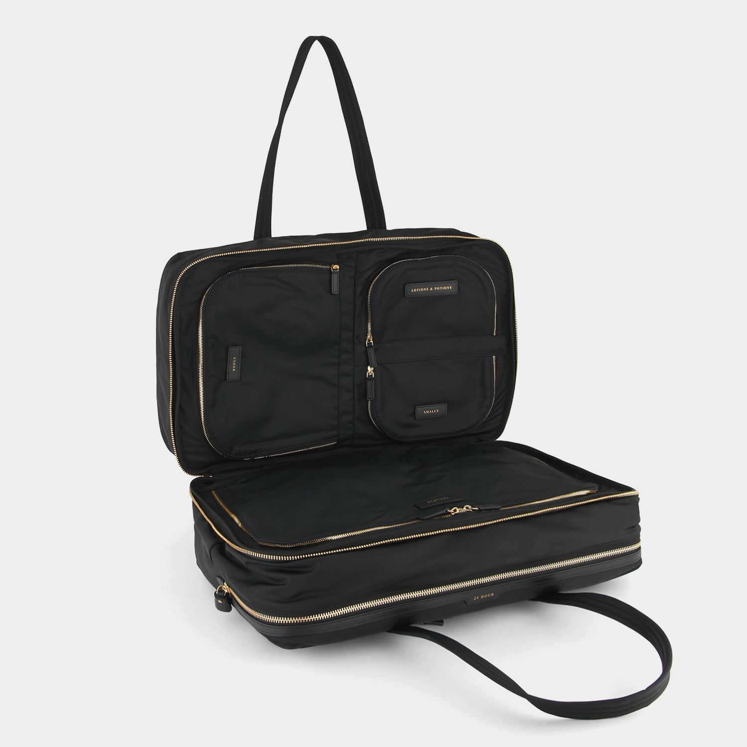 24 Hour Travel Bag -

                  
                    Econyl® Regenerated Nylon in Black -
                  

                  Anya Hindmarch US
