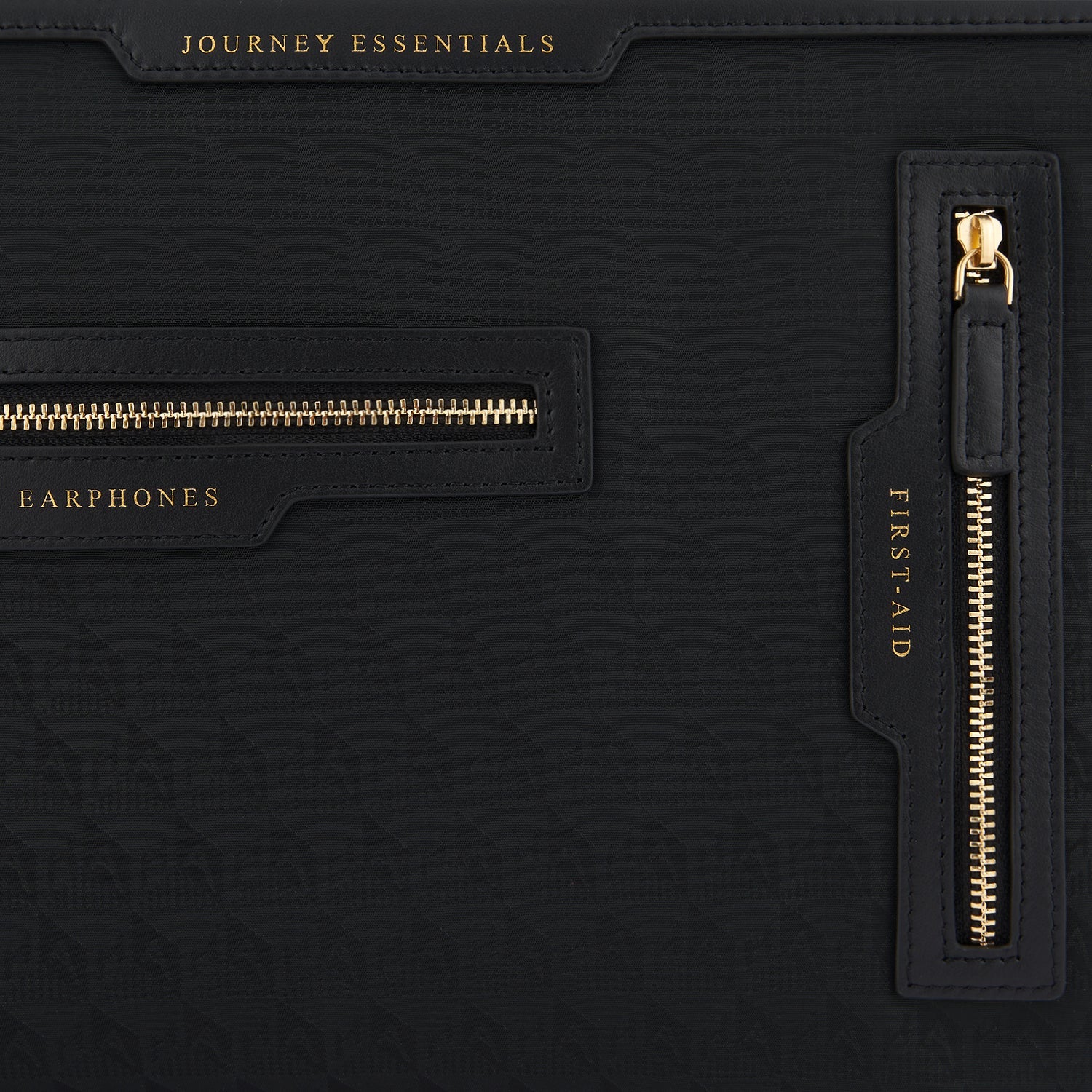 Logo Journey Essentials Pochette -

                  
                    Jacquard Nylon in Black -
                  

                  Anya Hindmarch US
