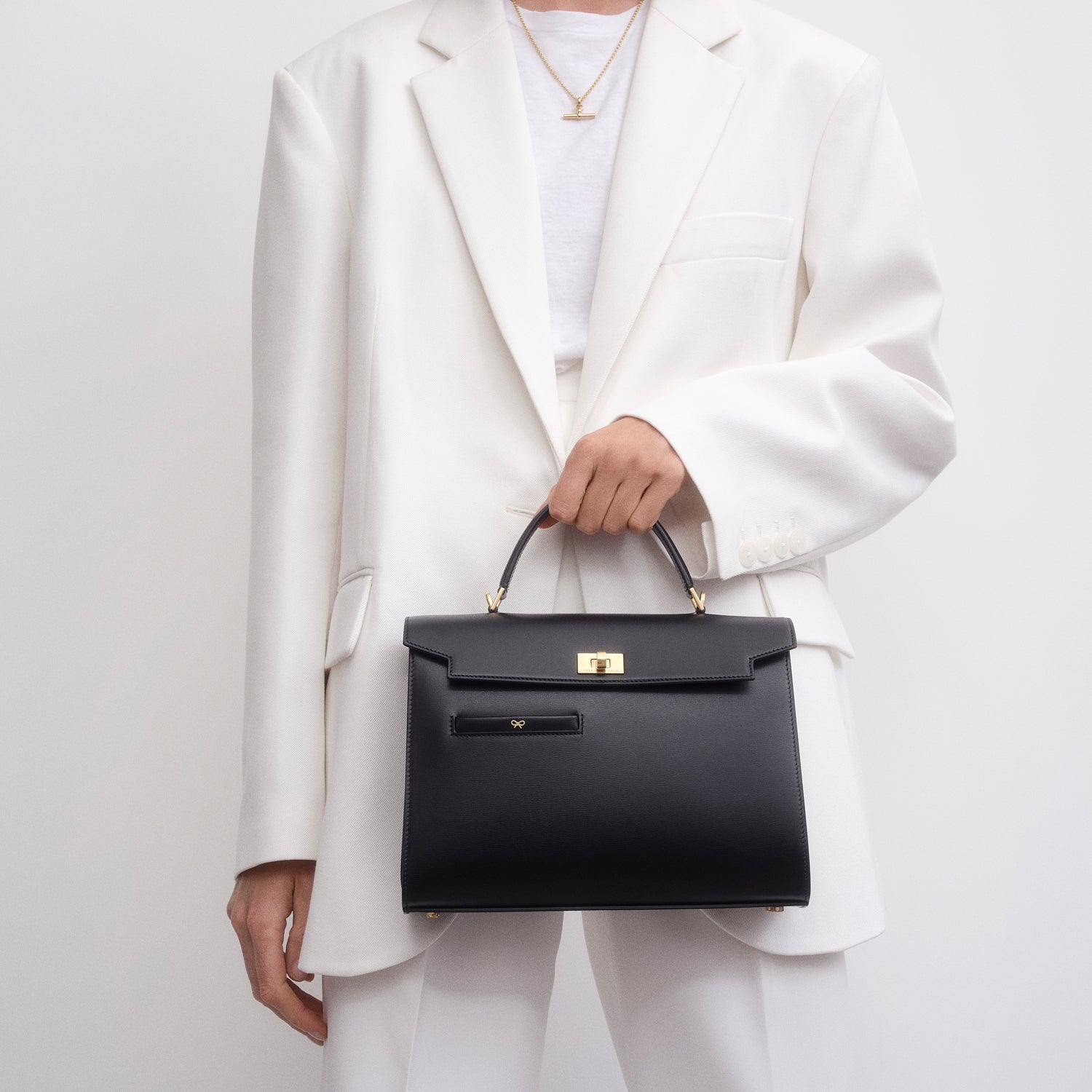 Mortimer Top Handle -

          
            Calf Leather in Black -
          

          Anya Hindmarch US
