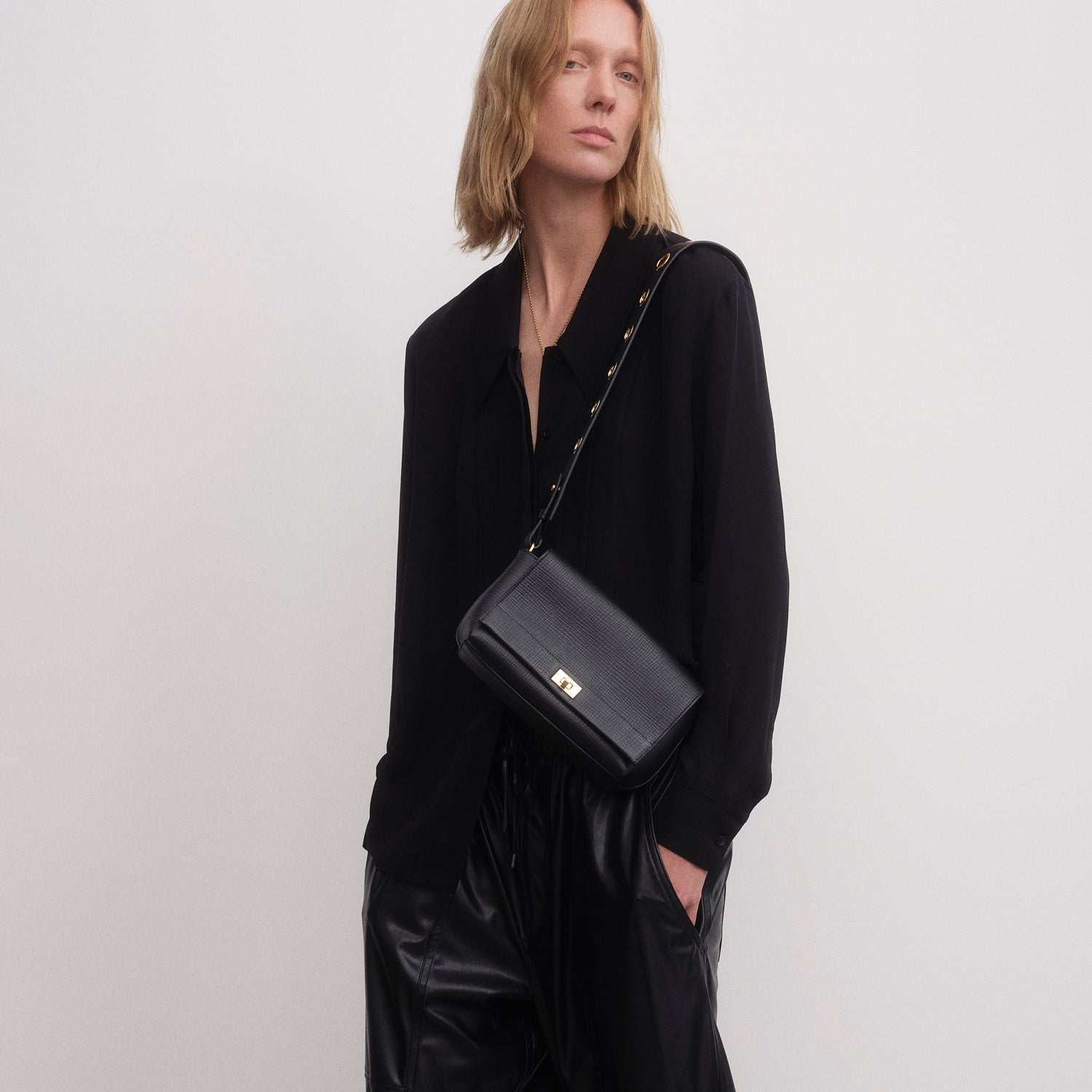 Mortimer Eyelet Cross-body -

          
            Crosshatch Leather in Black -
          

          Anya Hindmarch US
