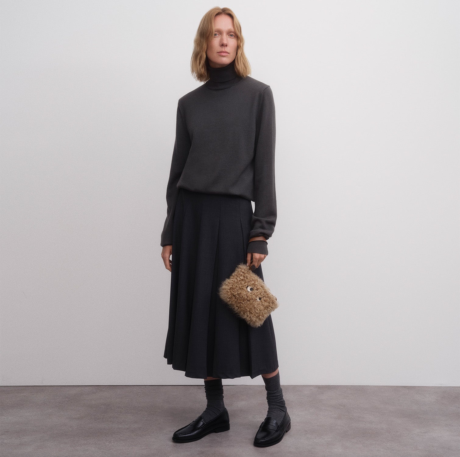 Shearling Eyes Clutch -

          
            Shearling/Smooth Leather leather in Taupe -
          

          Anya Hindmarch US
