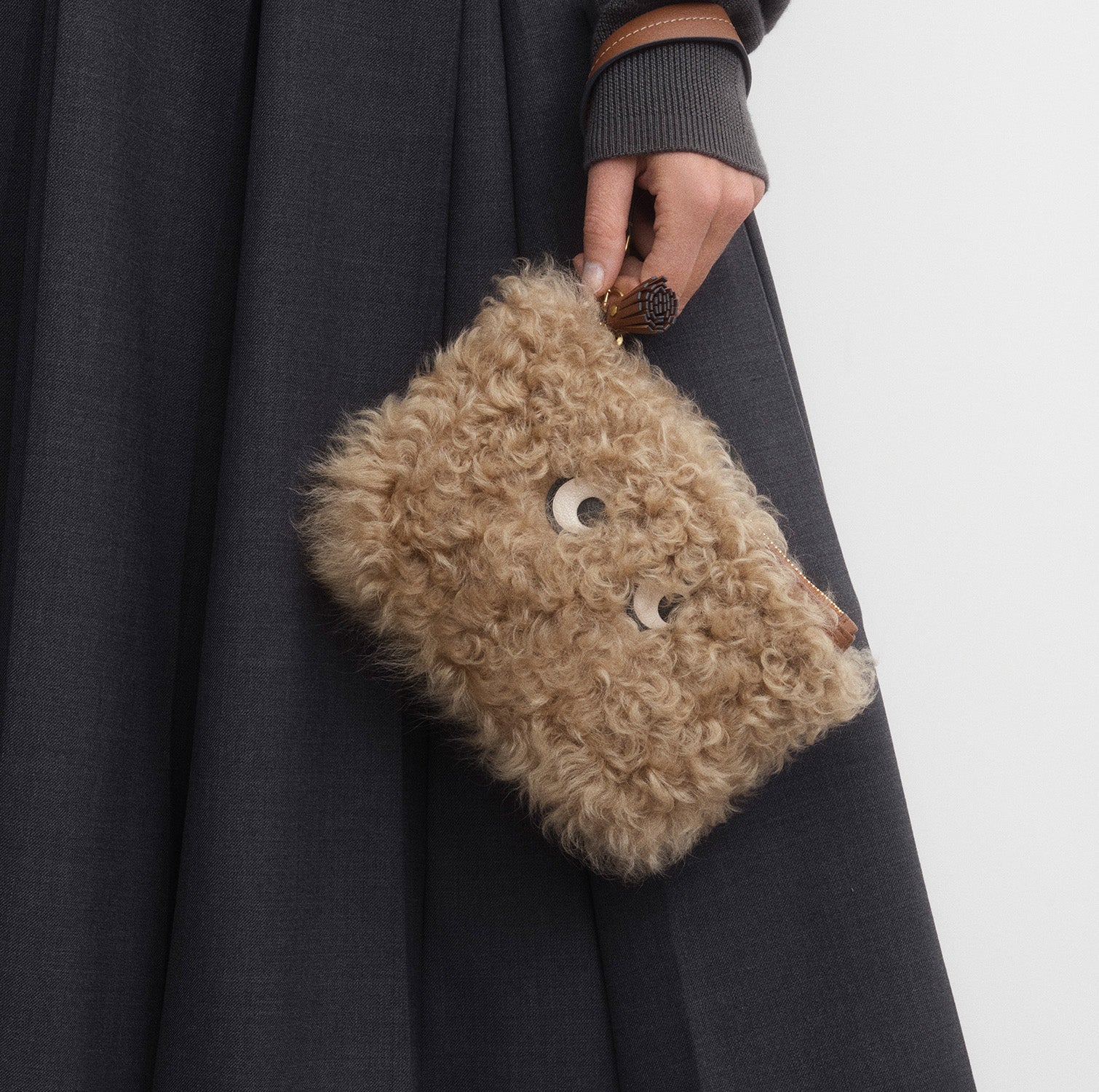 Shearling Eyes Clutch -

          
            Shearling/Smooth Leather leather in Taupe -
          

          Anya Hindmarch US
