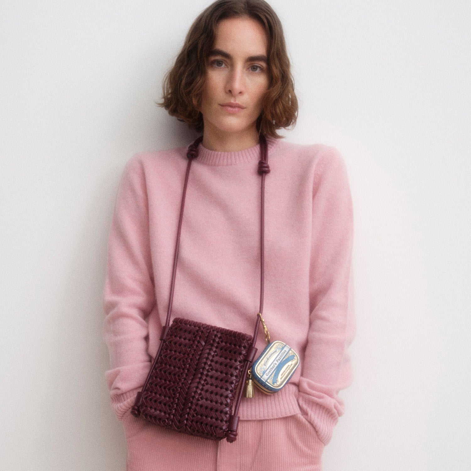 Neeson Cross-body Pouch -

          
            Calf Leather in Orchid Purple -
          

          Anya Hindmarch US
