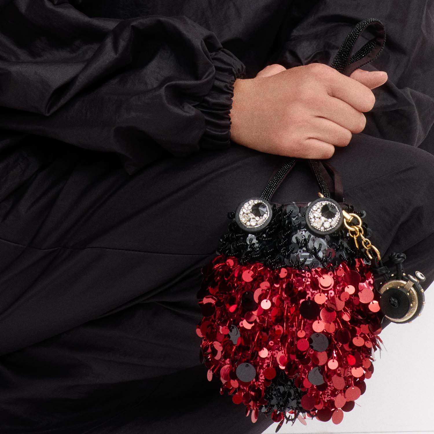 Ladybird Mini Bucket Bag -

          
            Sequins in black and red -
          

          Anya Hindmarch US
