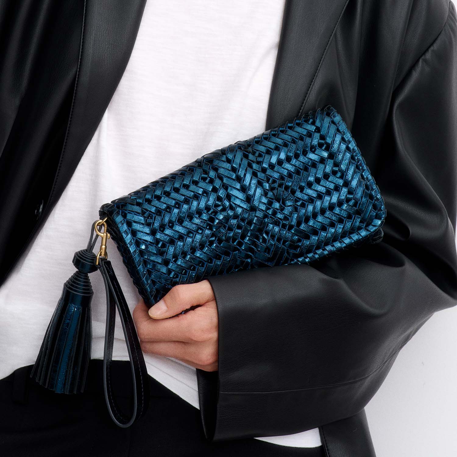 Neeson Tassel Clutch -

          
            Capra Leather in Metallic Blue -
          

          Anya Hindmarch US
