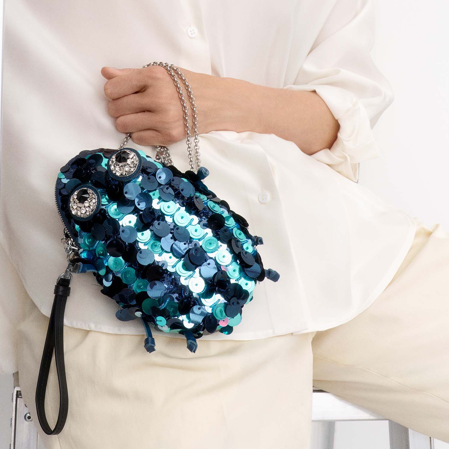 Embellished Bug Cross-body Pouch -

          
            Sequins in Petrol blue -
          

          Anya Hindmarch US

