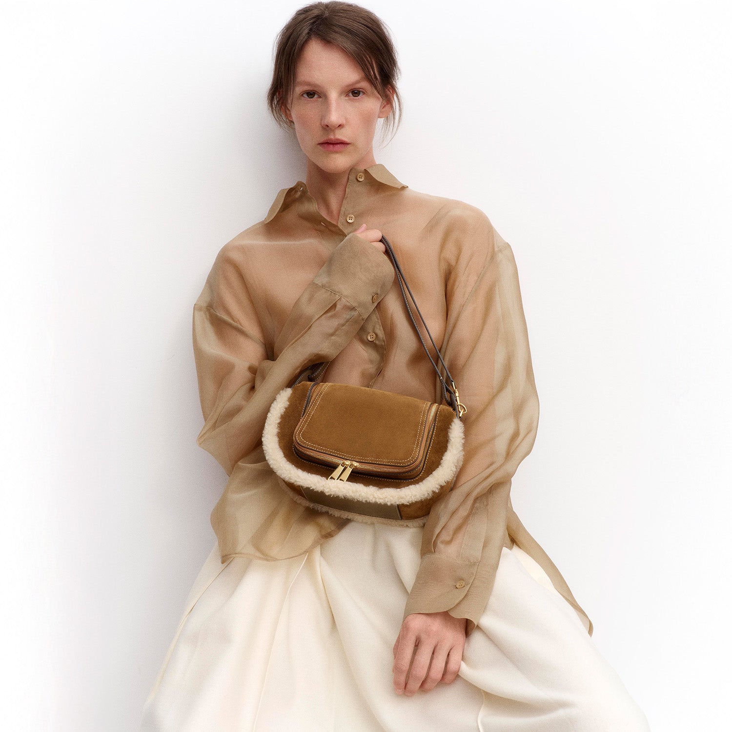 Vere Shearling Two-Way Cross-body -

          
            Shearling/Suede Leather in Moutarde -
          

          Anya Hindmarch US
