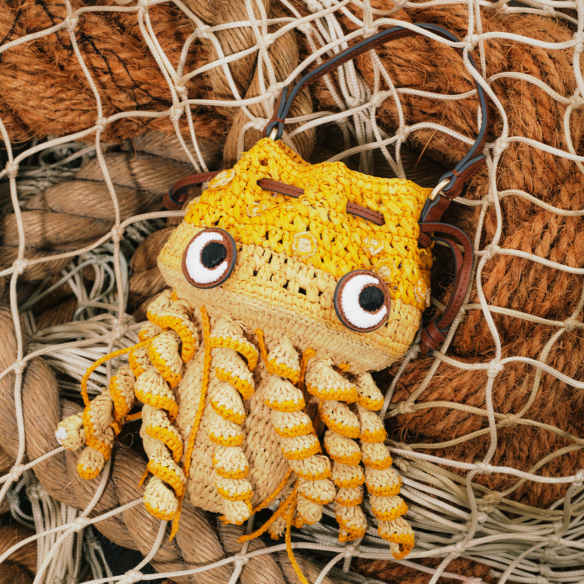 Raffia Jellyfish Cross-body -

          
            Raffia/Smooth Leather in Cumin Yellow  -
          

          Anya Hindmarch US
