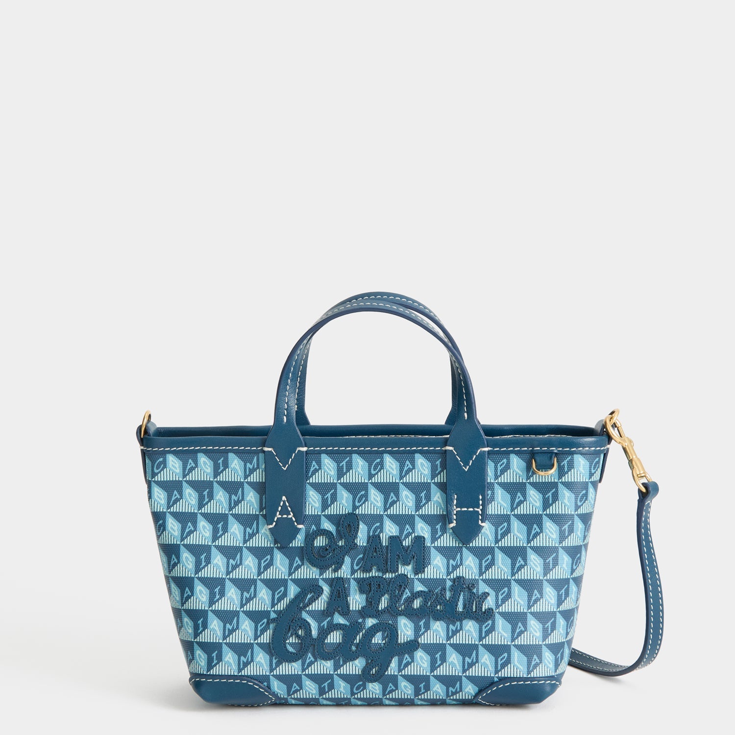 I Am A Plastic Bag Mini Tote -

          
            Recycled canvas/Satin leather in Petrol Blue -
          

          Anya Hindmarch US
