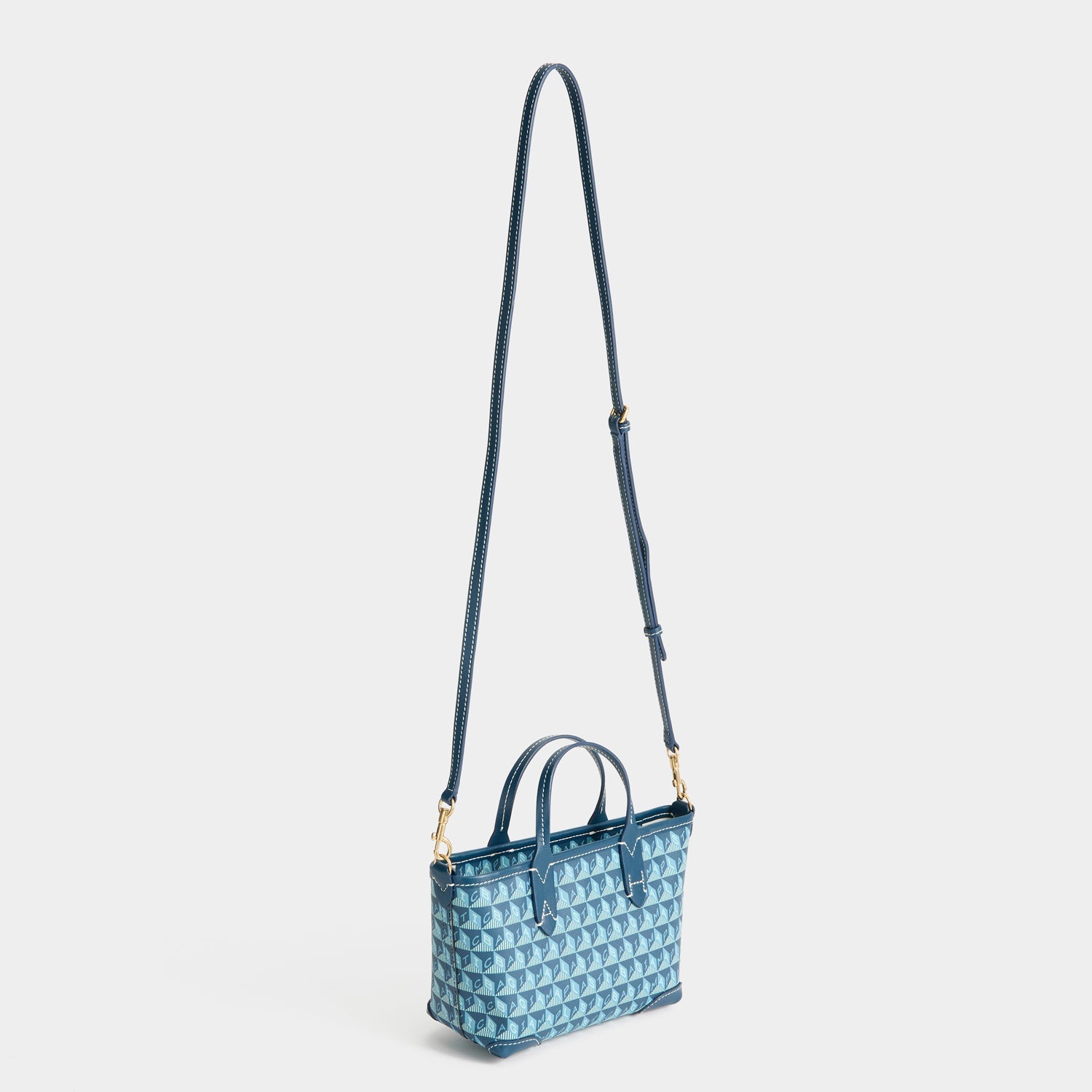 I Am A Plastic Bag XS Tote -

          
            Canvas in Petrol Blue -
          

          Anya Hindmarch US
