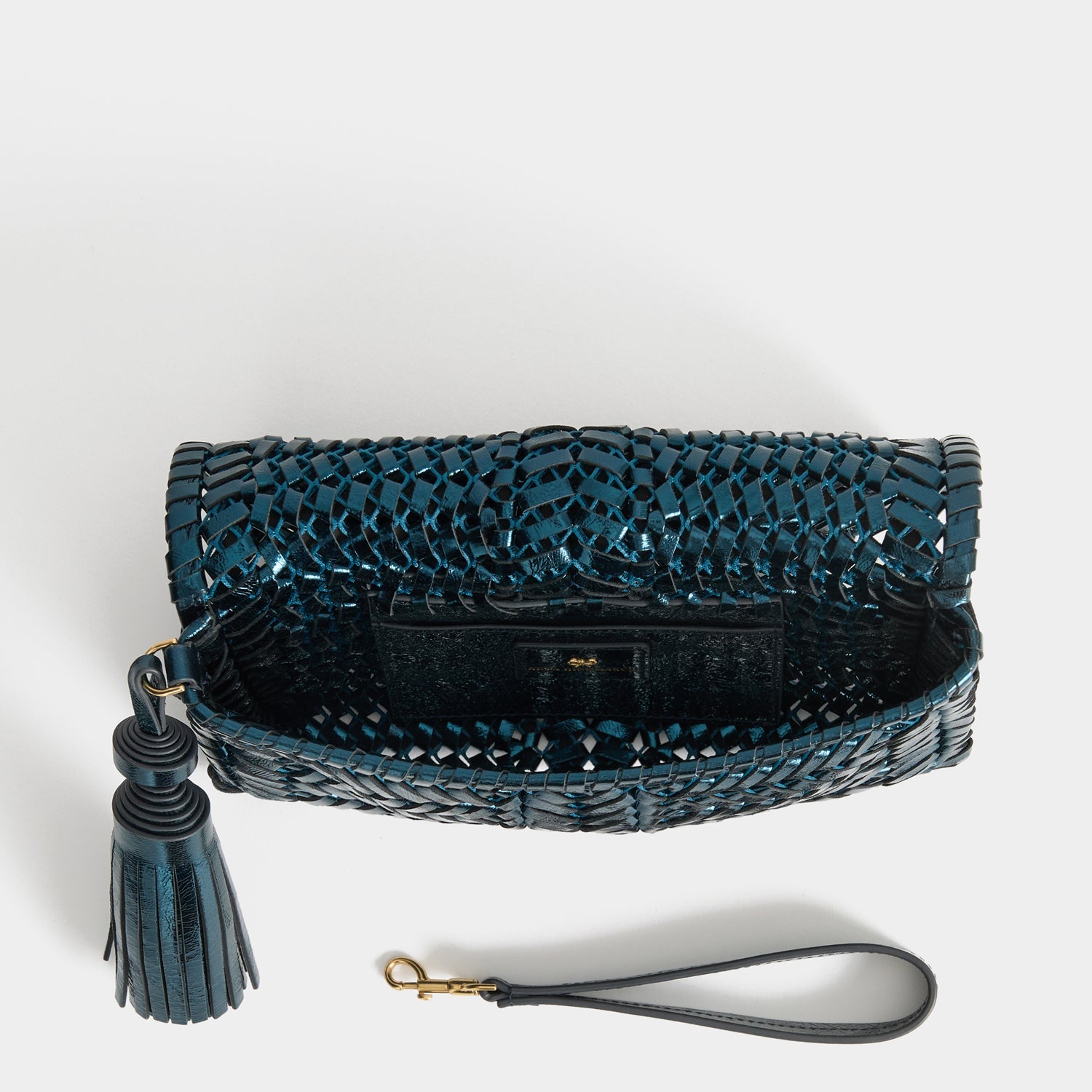 Neeson Tassel Clutch -

          
            Capra Leather in Metallic Blue -
          

          Anya Hindmarch US
