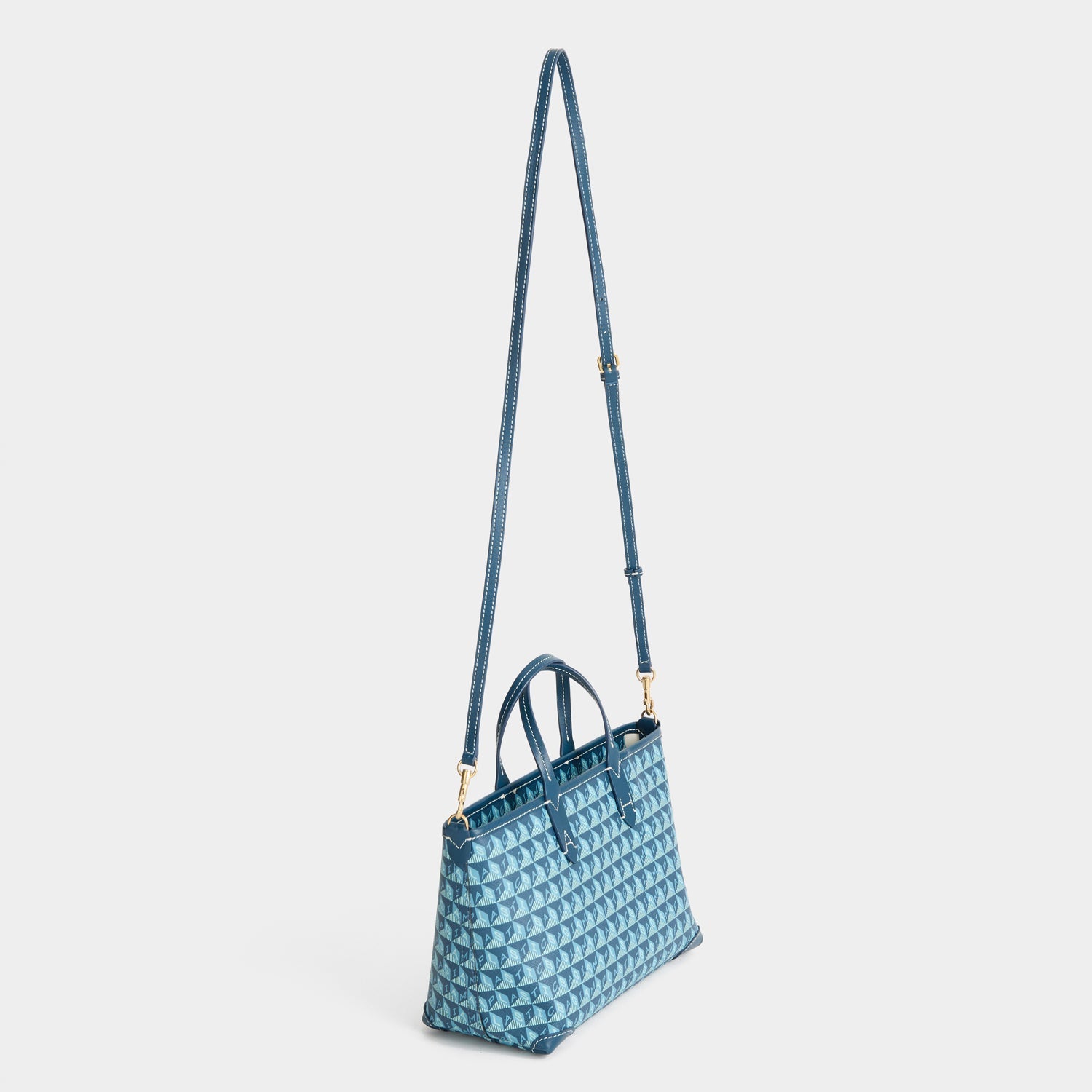 I Am A Plastic Bag Mini Tote -

          
            Recycled canvas/Satin leather in Petrol Blue -
          

          Anya Hindmarch US
