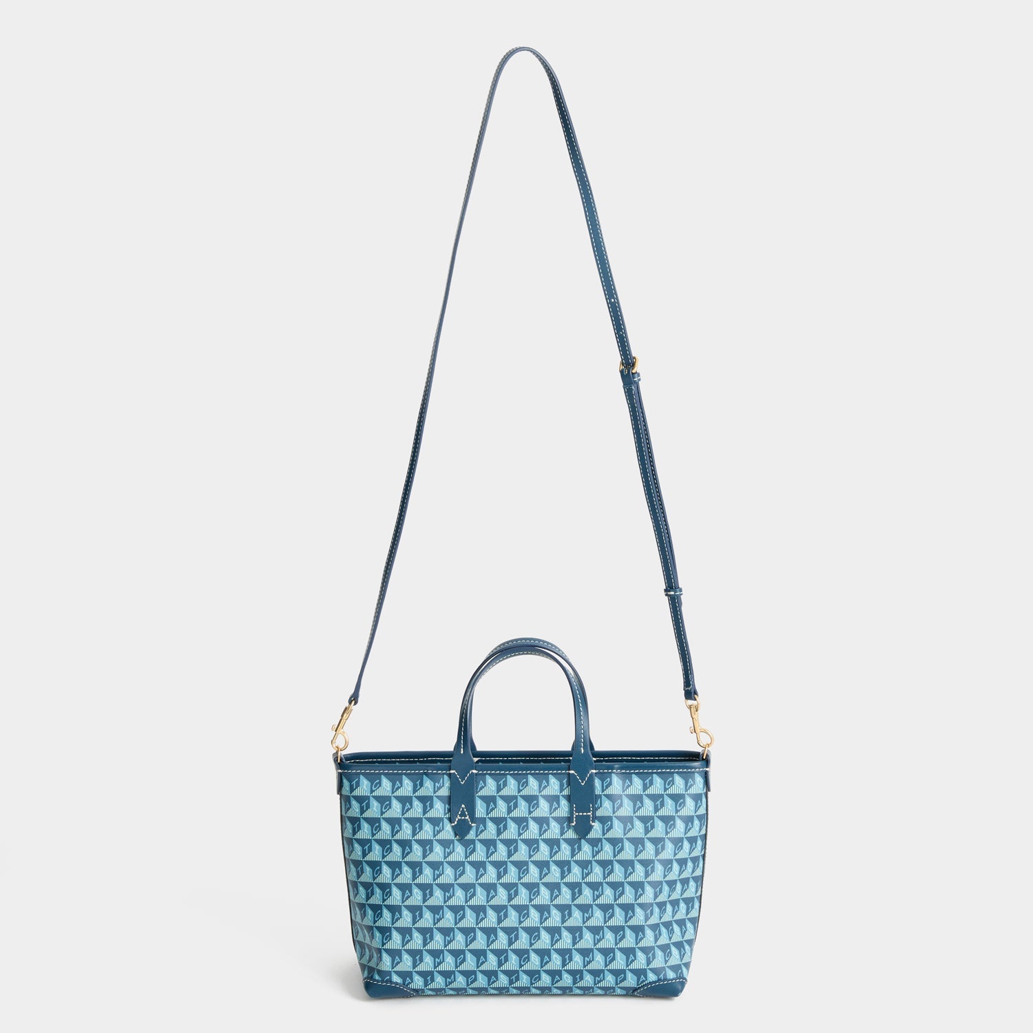 I Am A Plastic Bag Mini Tote -

          
            Recycled canvas/Satin leather in Petrol Blue -
          

          Anya Hindmarch US
