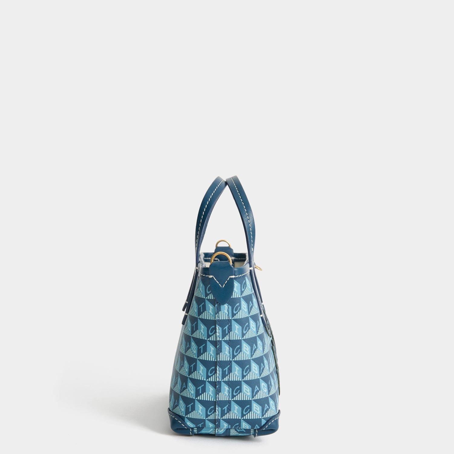 I Am A Plastic Bag Mini Tote -

          
            Recycled canvas/Satin leather in Petrol Blue -
          

          Anya Hindmarch US
