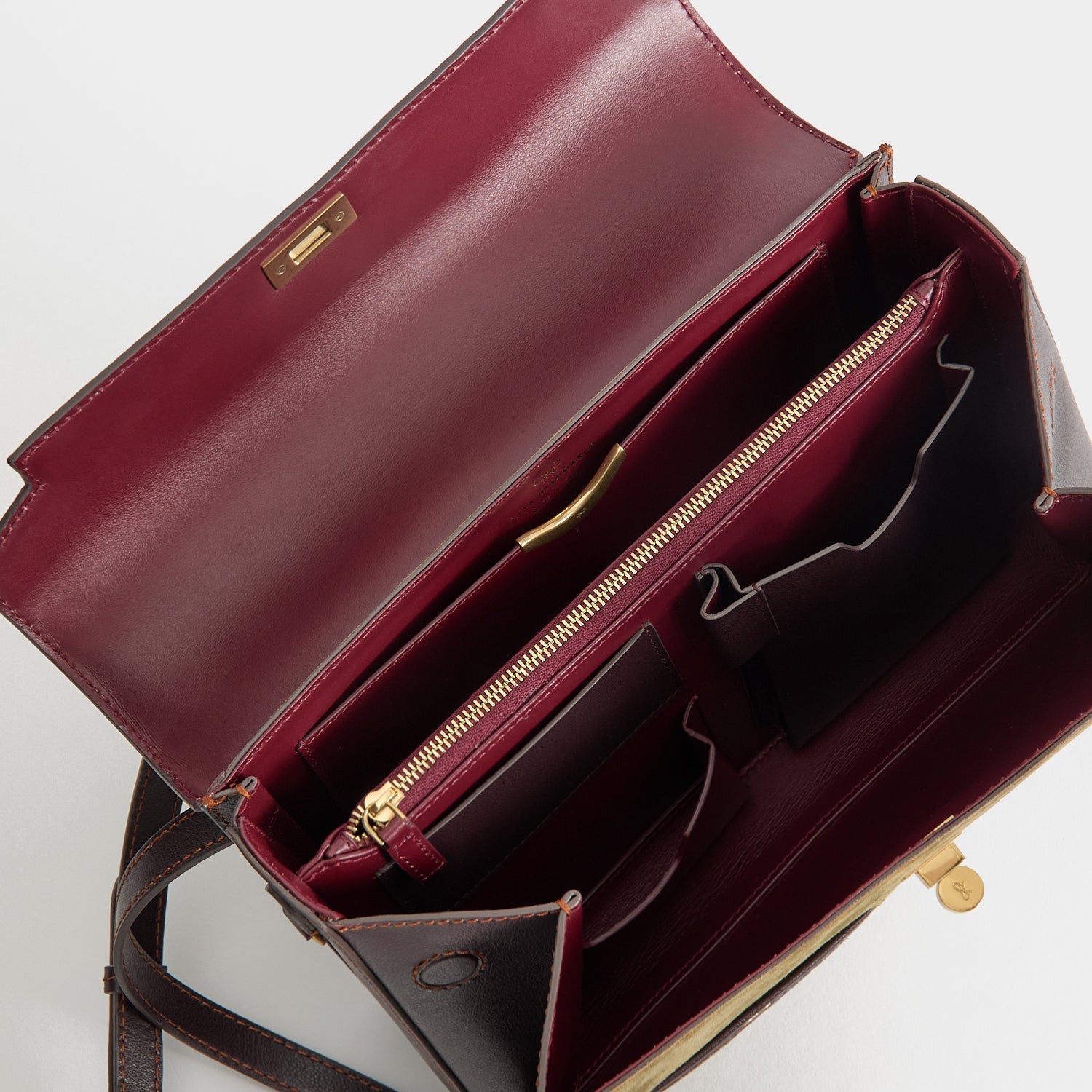 Mortimer Frame Top Handle -

          
            Suede Leather/Calf Leather in Bonsai green and Grape -
          

          Anya Hindmarch US
