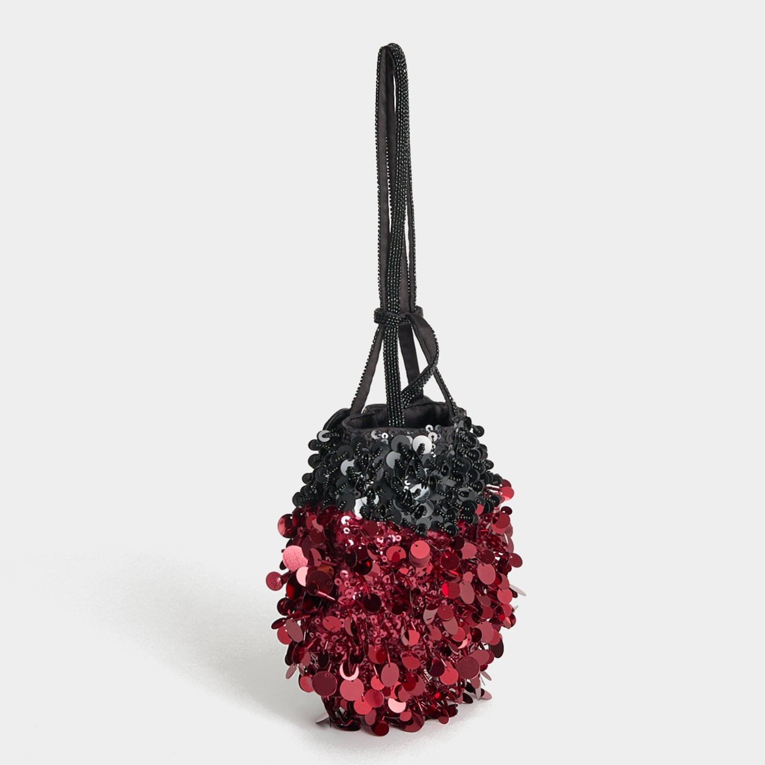 Ladybird Mini Bucket Bag -

          
            Sequins in black and red -
          

          Anya Hindmarch US
