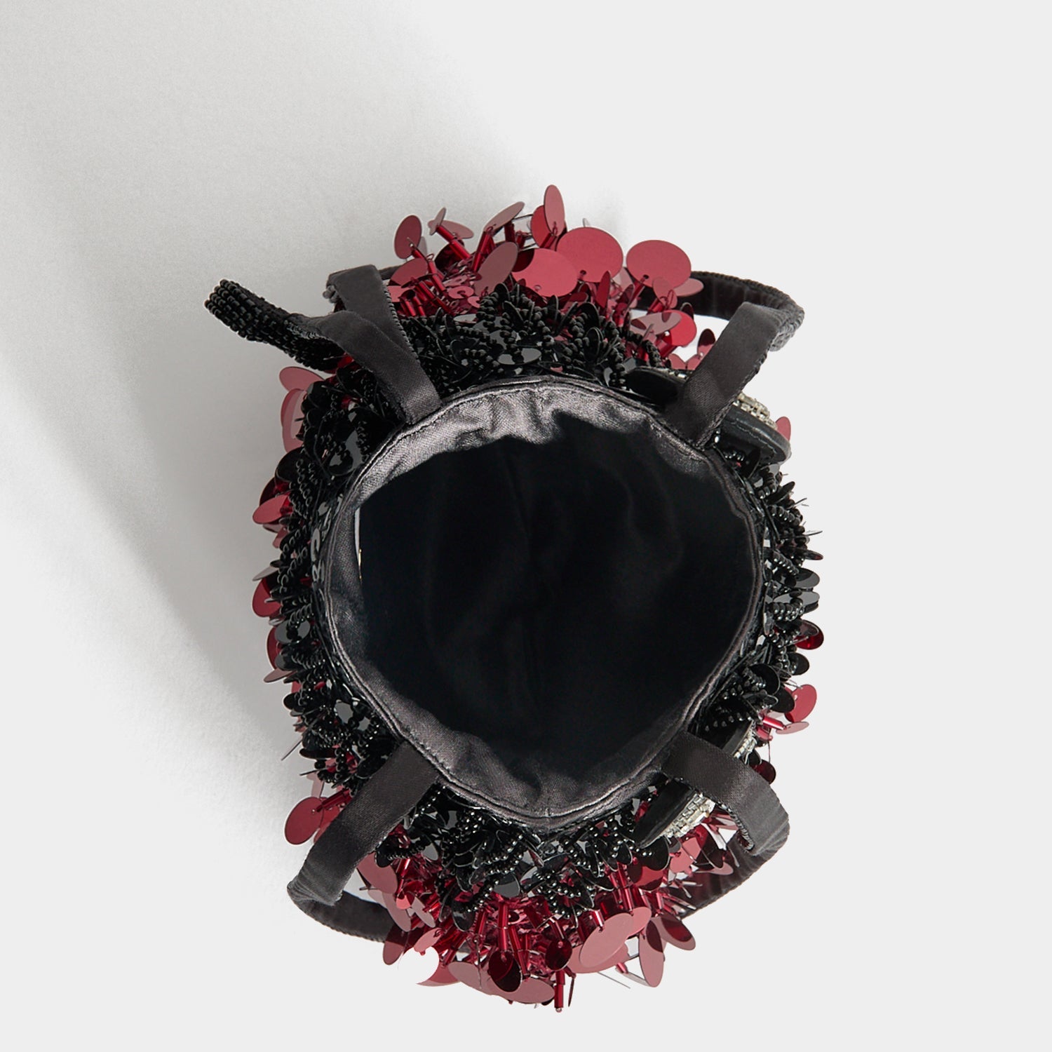 Ladybird Mini Bucket Bag -

          
            Sequins in black and red -
          

          Anya Hindmarch US
