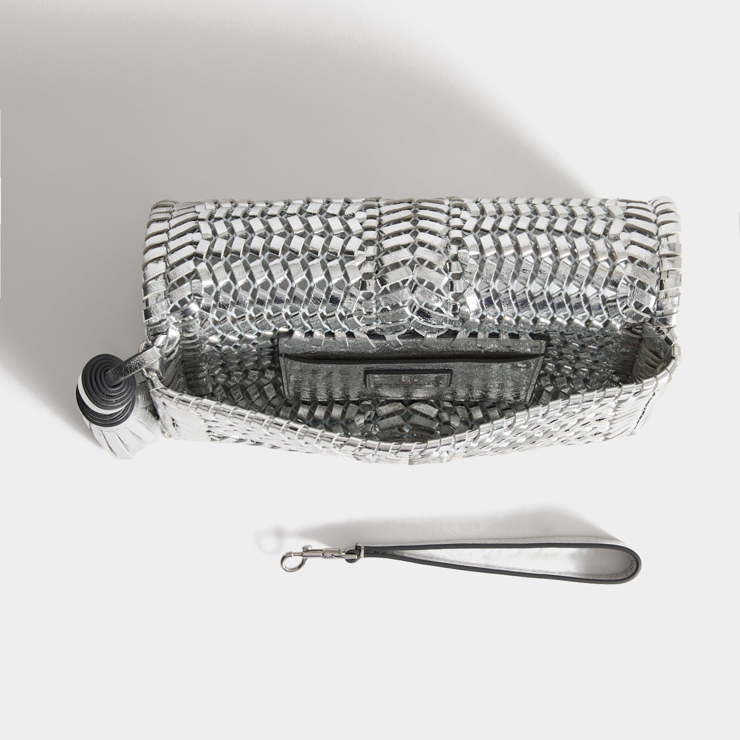 Neeson Tassel Clutch -

          
            Capra Leather in Silver -
          

          Anya Hindmarch US
