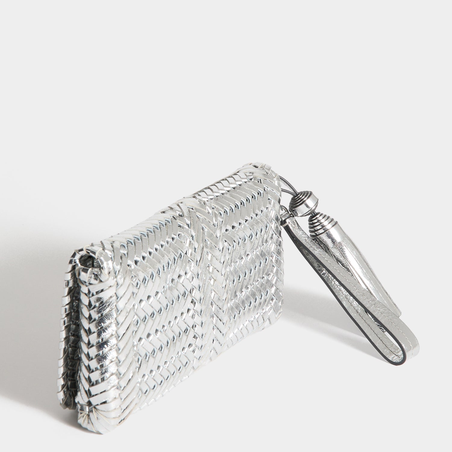 Neeson Tassel Clutch -

          
            Capra Leather in Silver -
          

          Anya Hindmarch US
