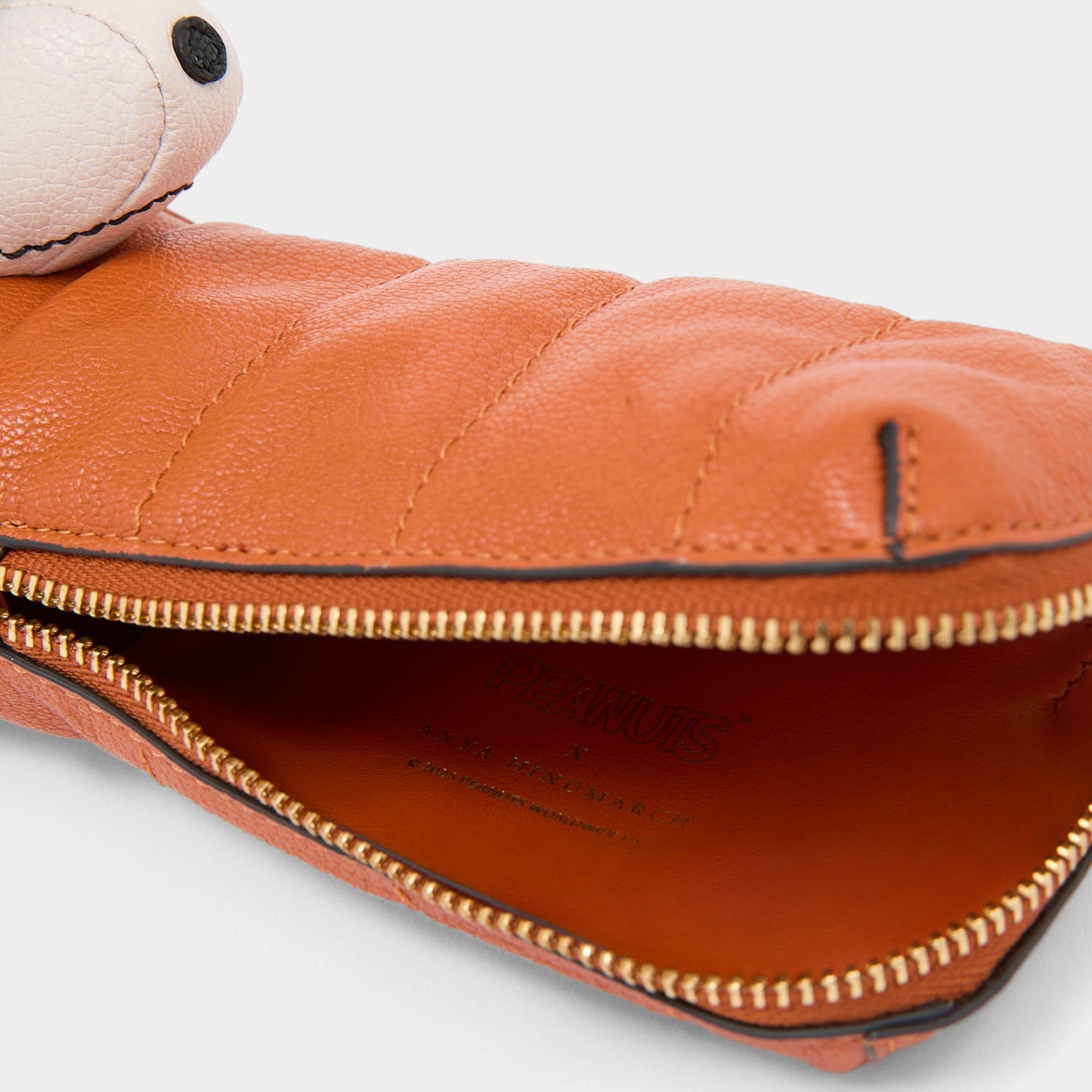 Peanuts Snoopy Pencil Case -

          
            Capra Leather in Dark Clementine Orange -
          

          Anya Hindmarch US
