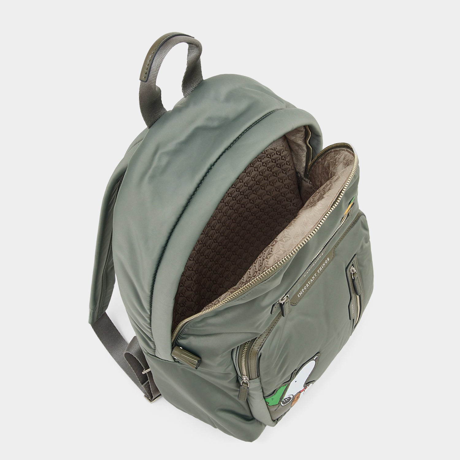 Peanuts Snoopy Backpack -

          
            Recycled padded fabric in Fern Green -
          

          Anya Hindmarch US

