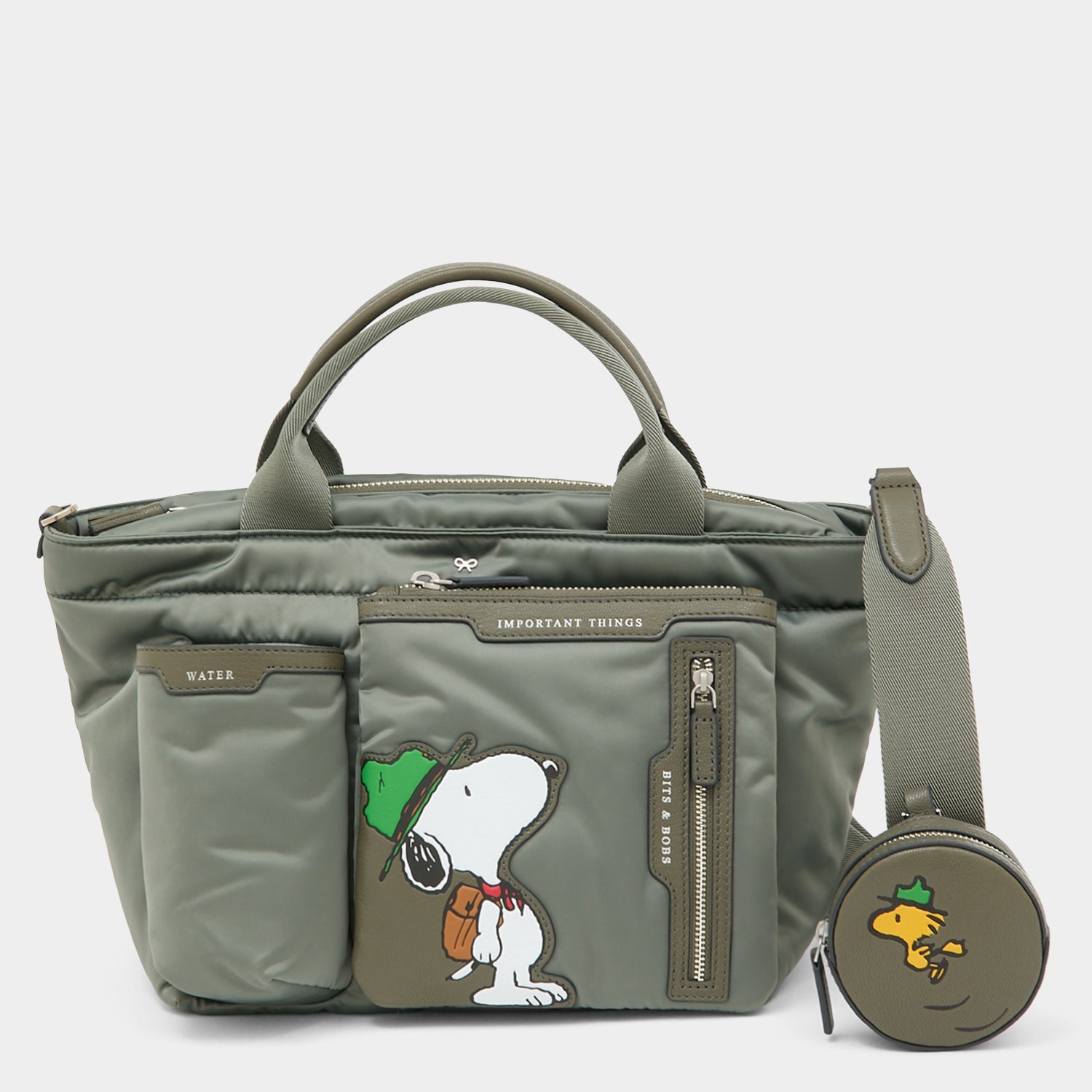 Peanuts Snoopy E/W Mini Tote -

          
            Recycled padded fabric in Fern Green -
          

          Anya Hindmarch US
