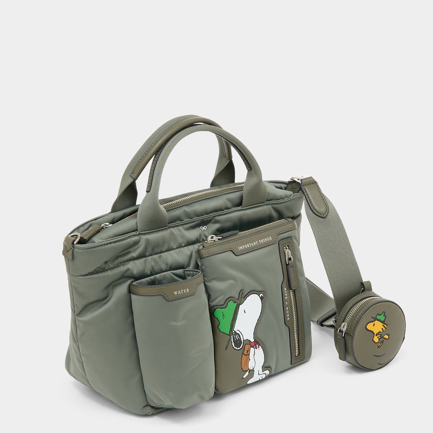 Peanuts Snoopy E/W Mini Tote -

          
            Recycled padded fabric in Fern Green -
          

          Anya Hindmarch US
